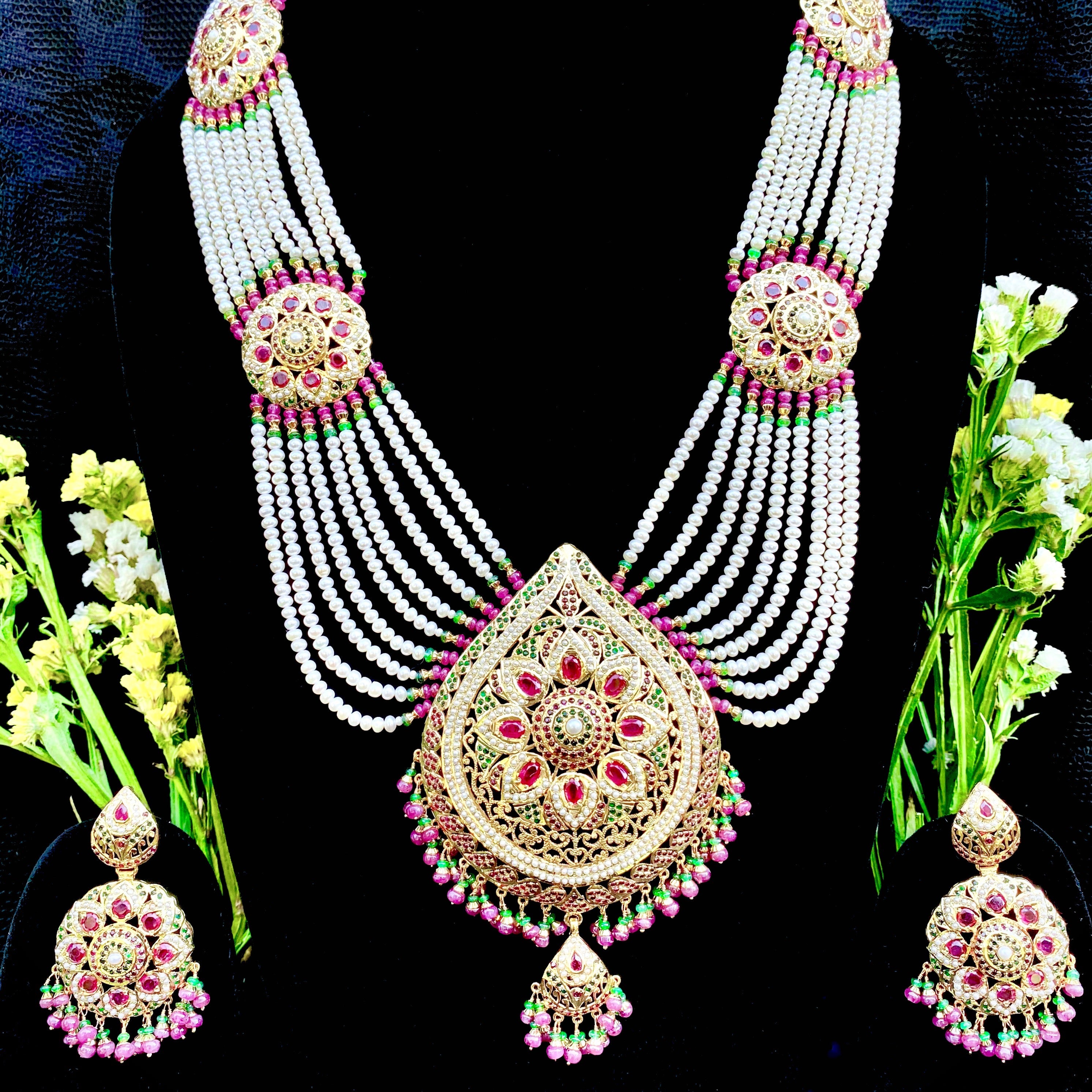 rani haar set adorned with stones and pearls