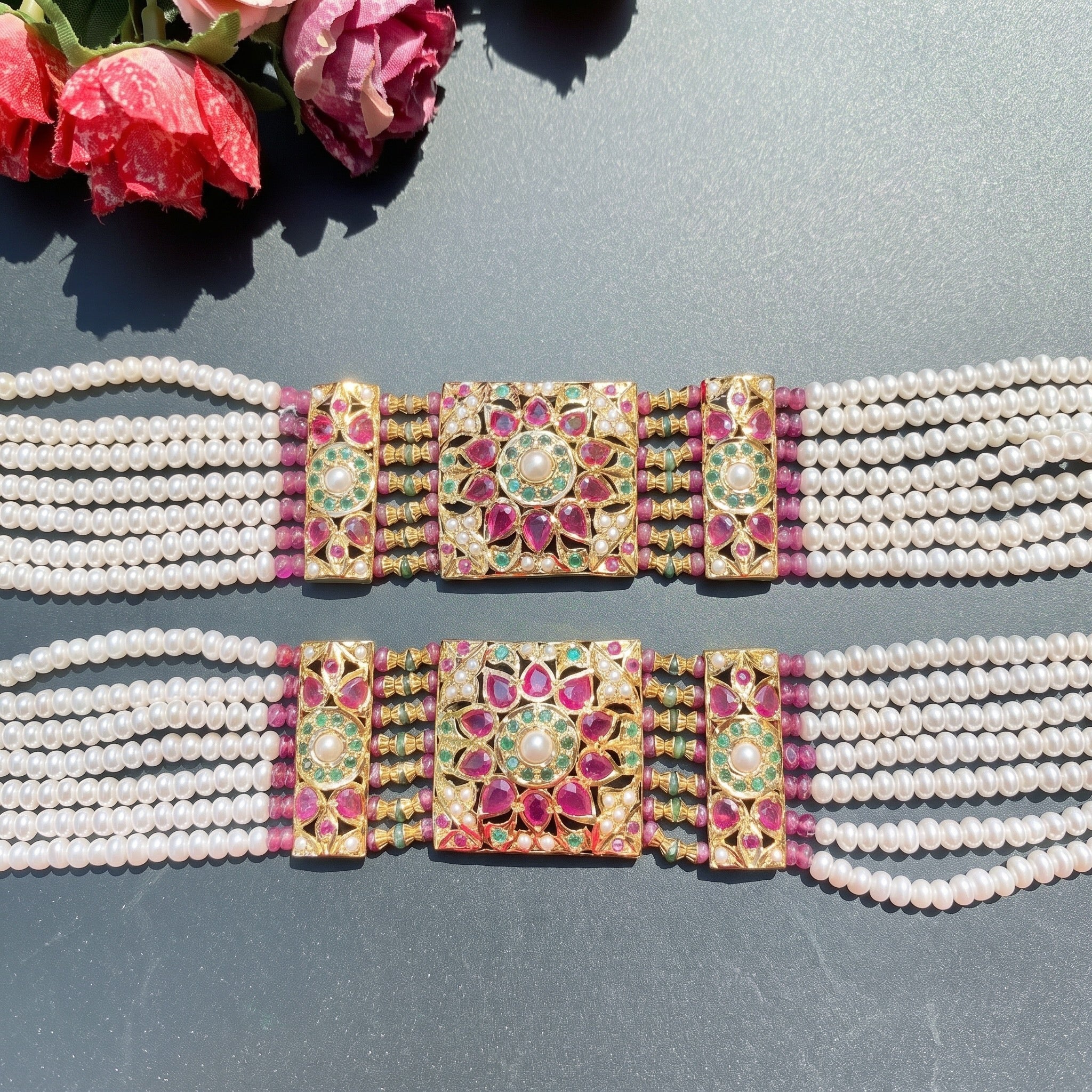 pair of bracelets in 22k gold studded with stones