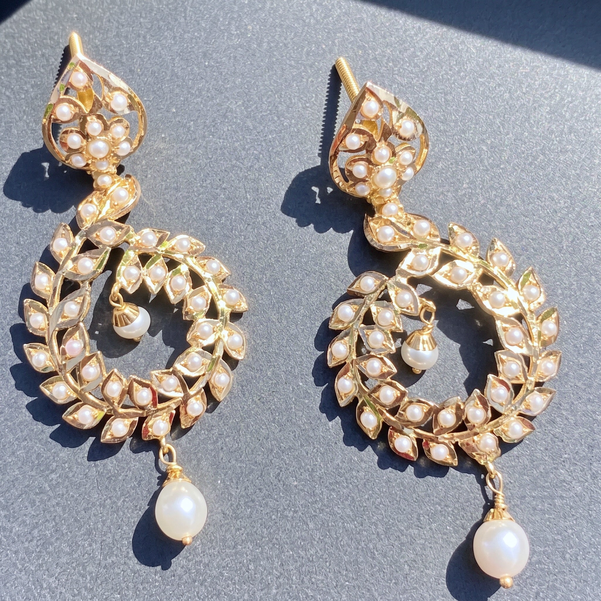 22k gold earrings studded with pearl drops