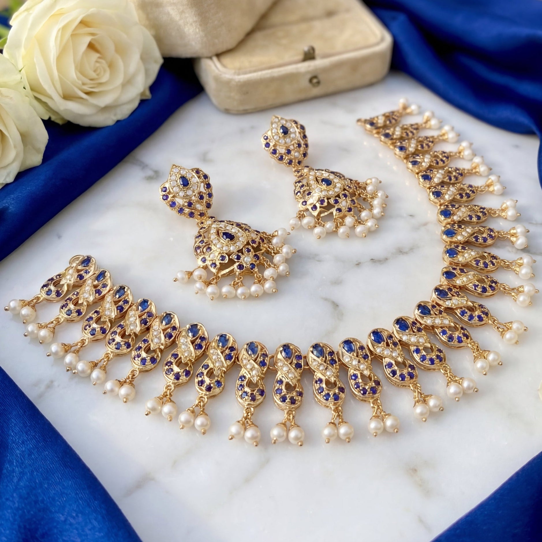 गोल्ड प्लेटेड जड़ाऊ सेट | सिल्वर बेस्ड | नीलम और मोती के आभूषण NS 260