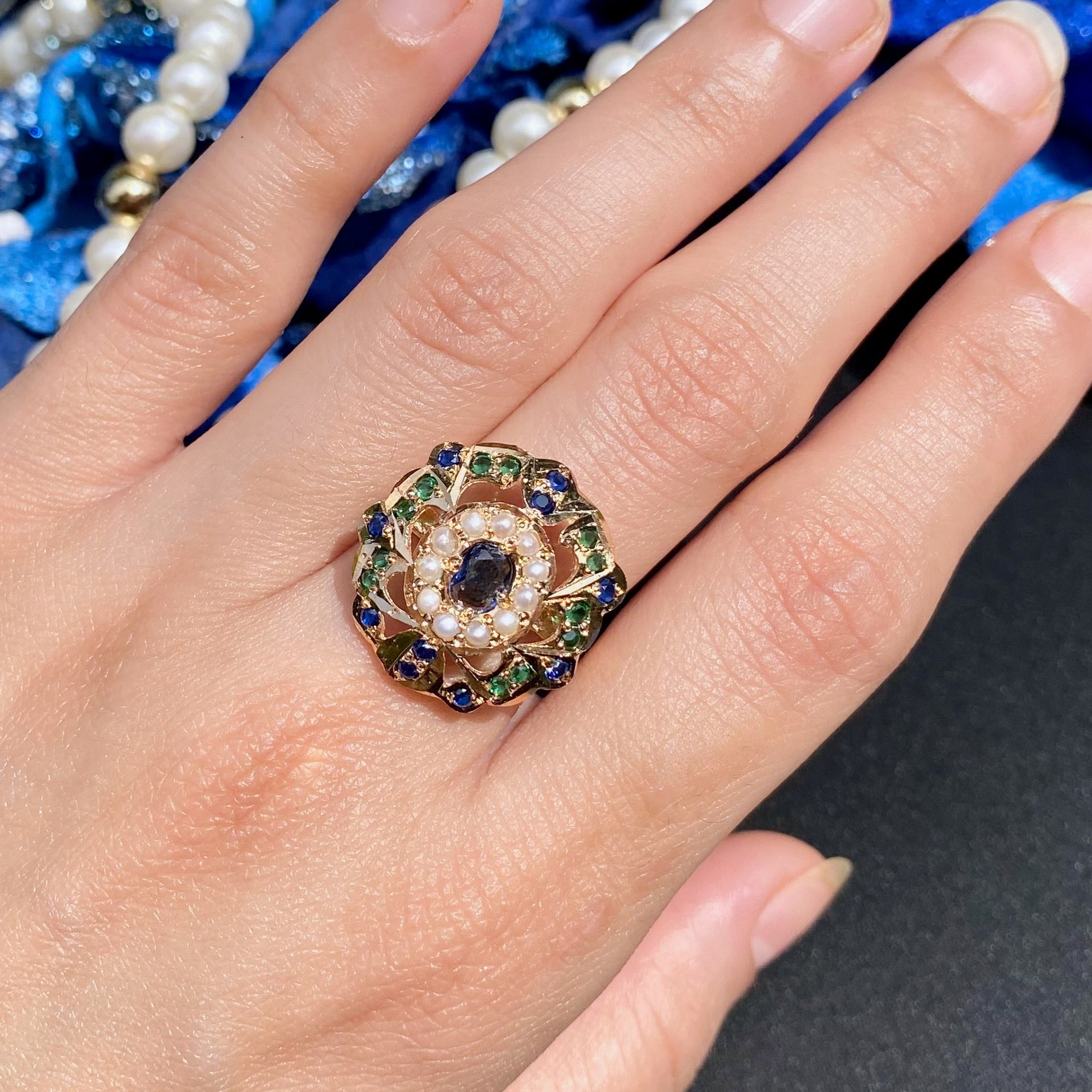 delicate sapphire emerald pearl ring gold polished