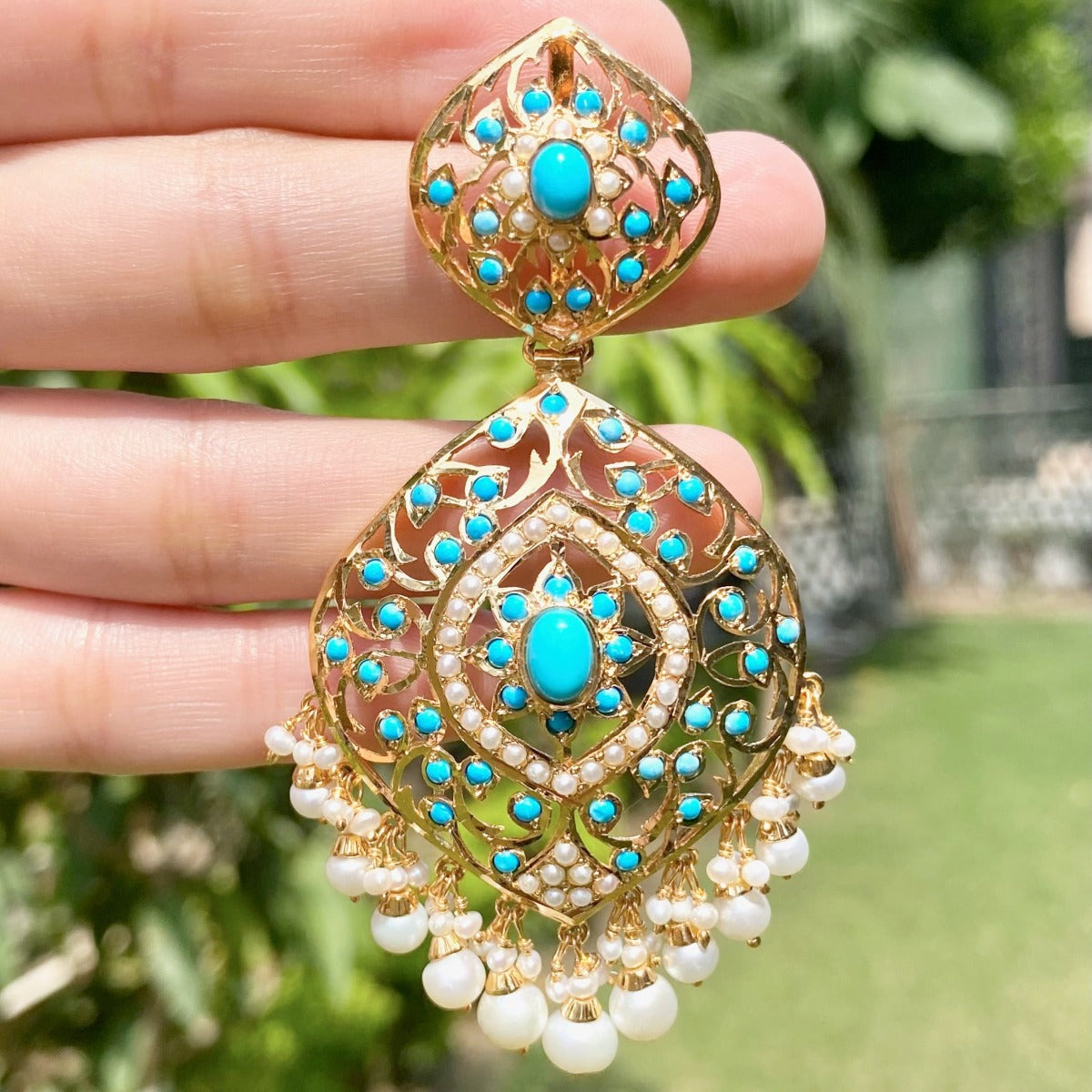 jadau earrings in silver with gold plating