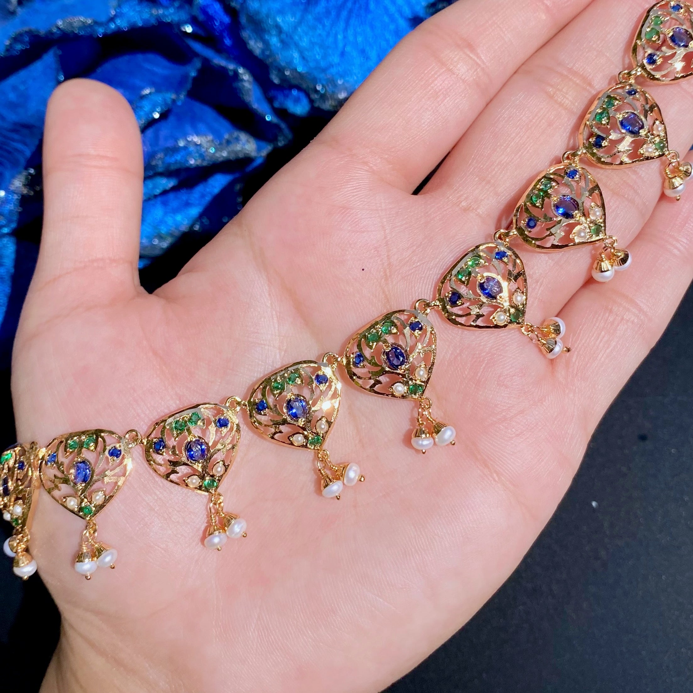 delicate jadau neckpiece with stud earrings