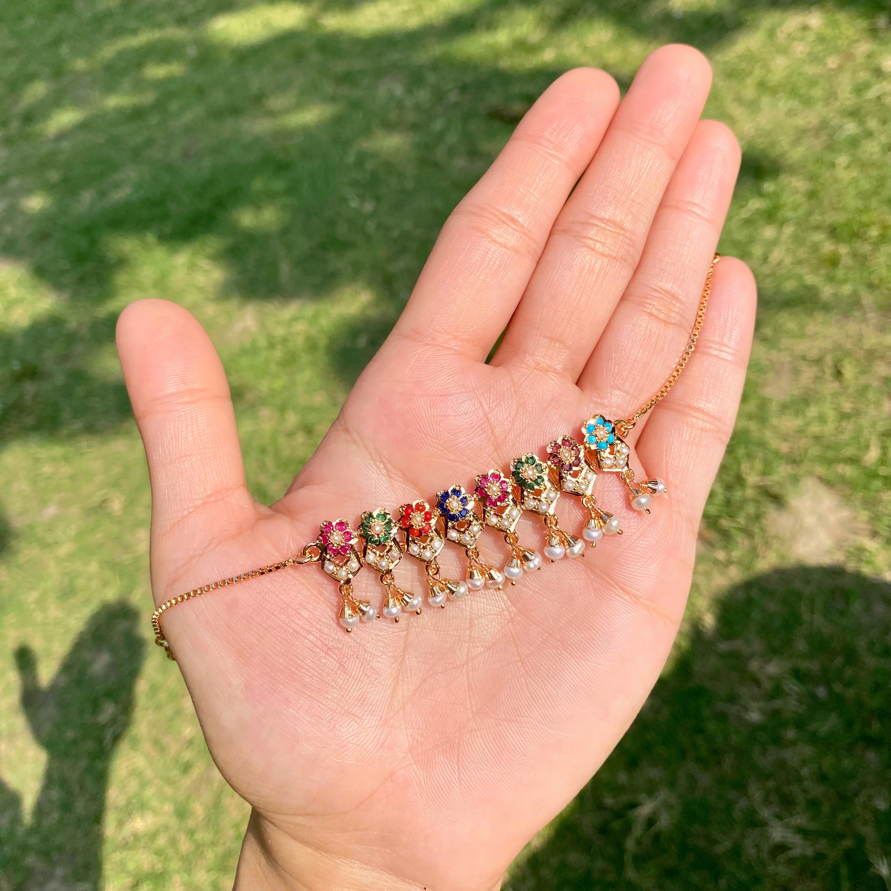 Product Title: Navratna Pearl Fringe Jadau Bracelet | Gold Plated Silver BG 185