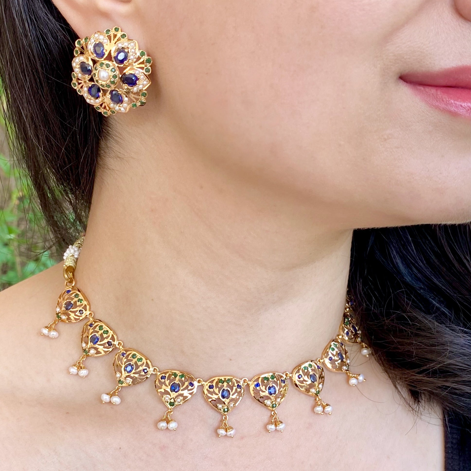 delicate jadau neckpiece with stud earrings