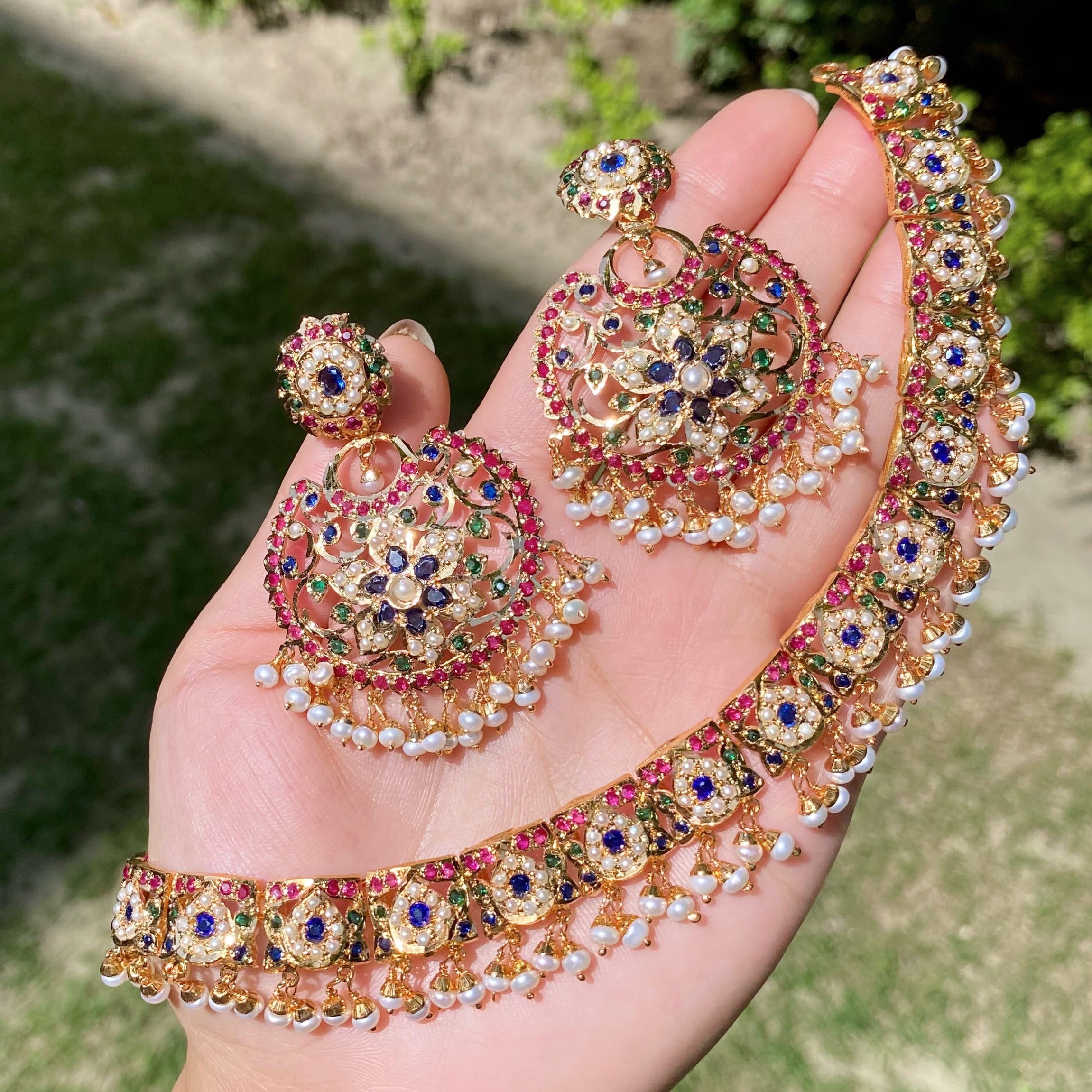 gold plated jadau neck piece and earrings