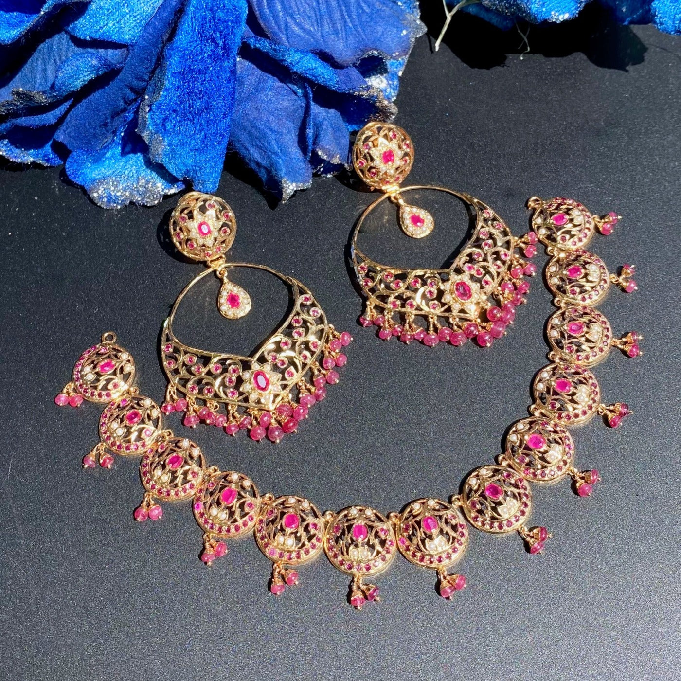gold plated jadau set with rubies