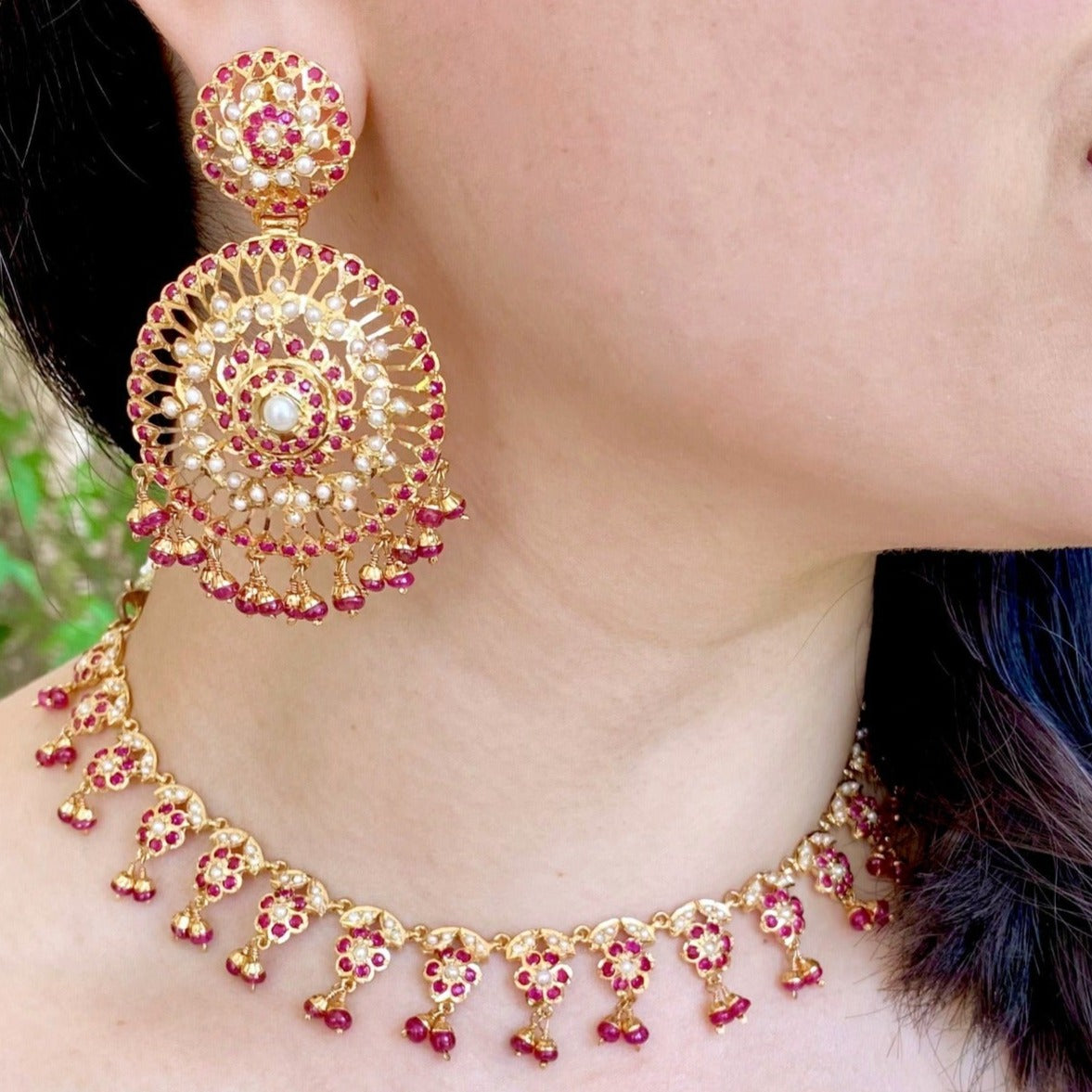 dainty ruby necklace with large earrings