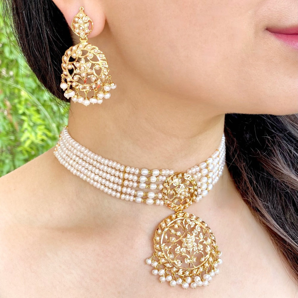 Indo-western pearl choker set in 22k gold studded with seed pearls,