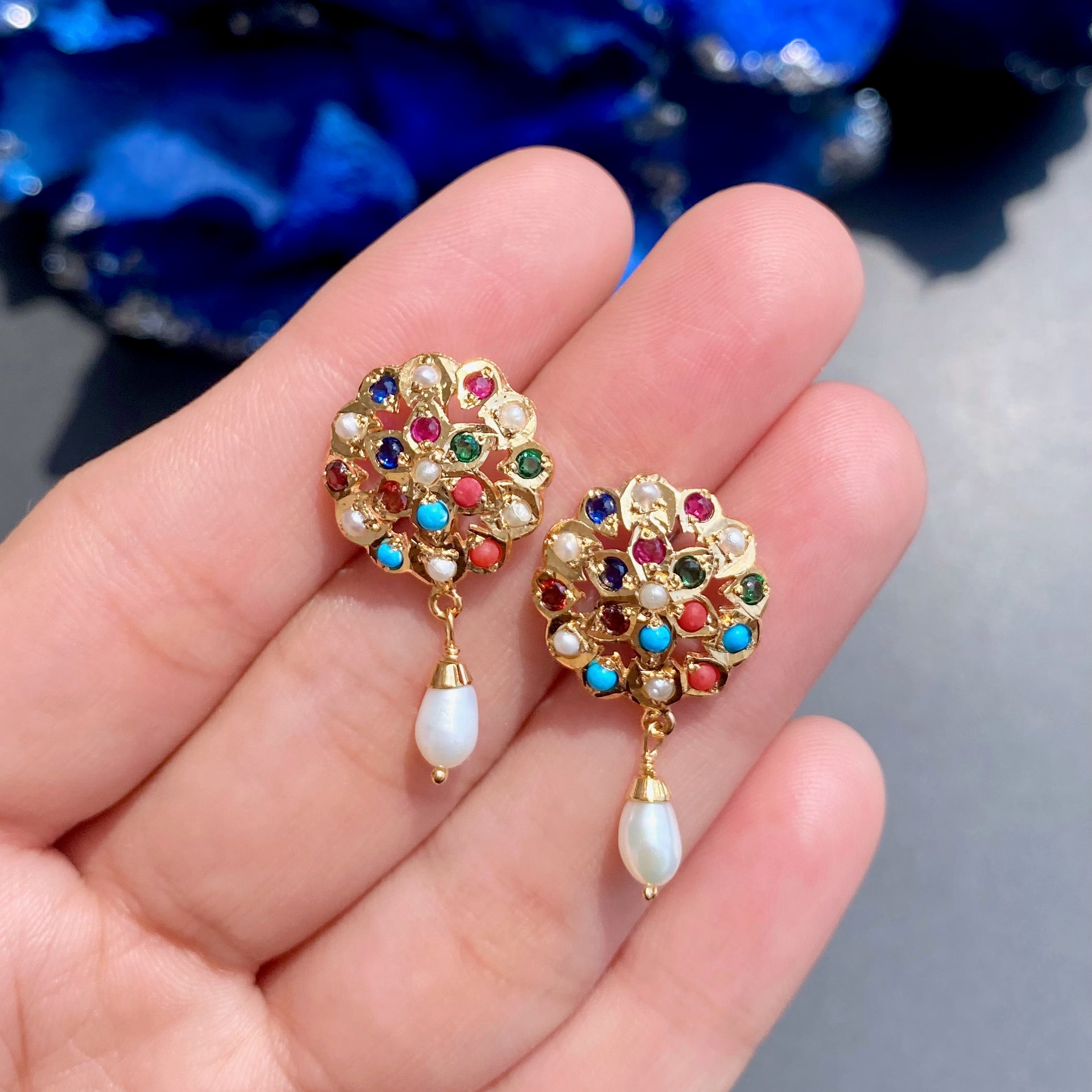 delicate navaratna stud earrings