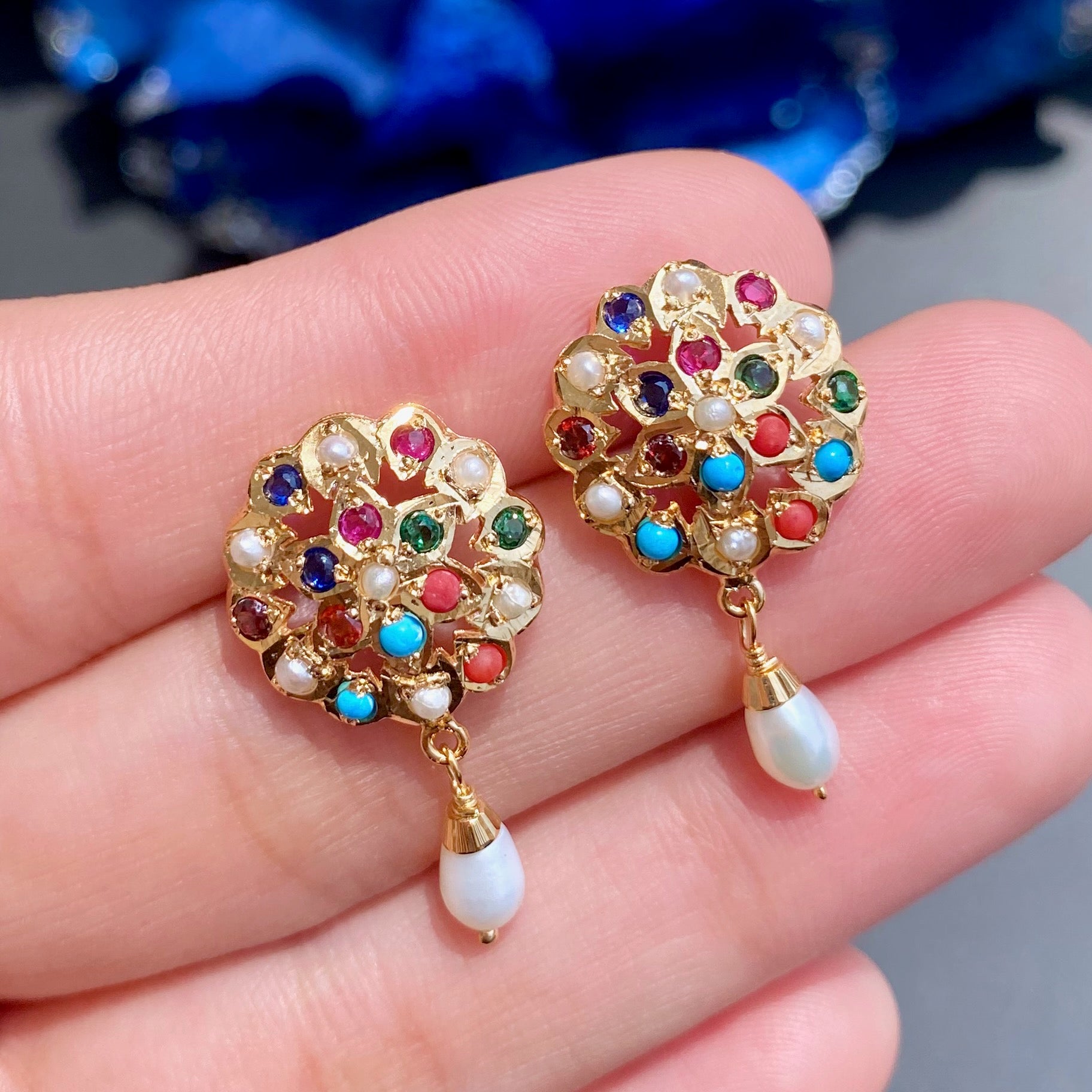 delicate navaratna stud earrings