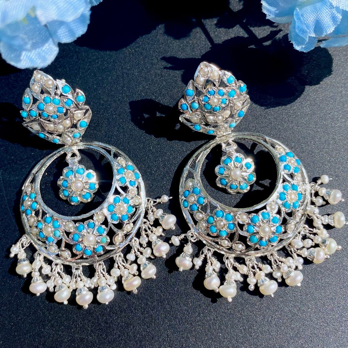 jadau earrings in white silver 