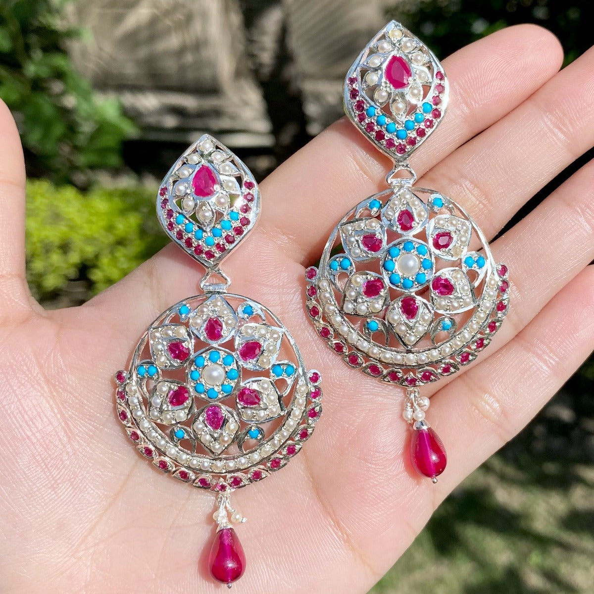 jadau earrings in silver finish