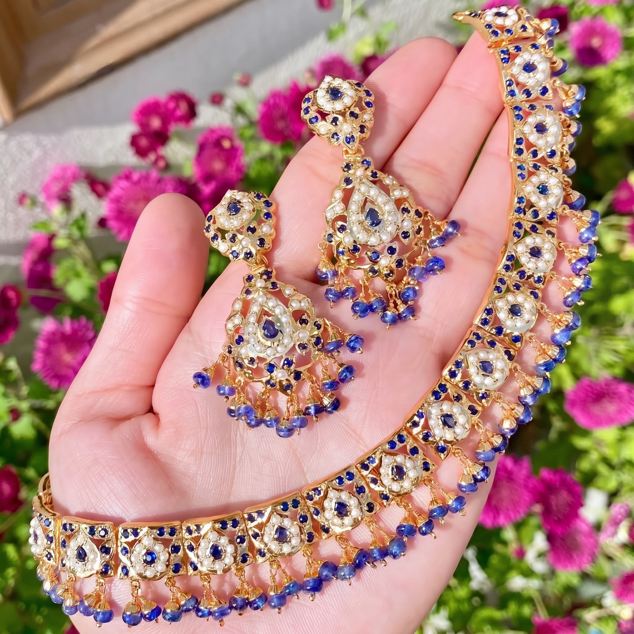 necklace set with deep blue stones