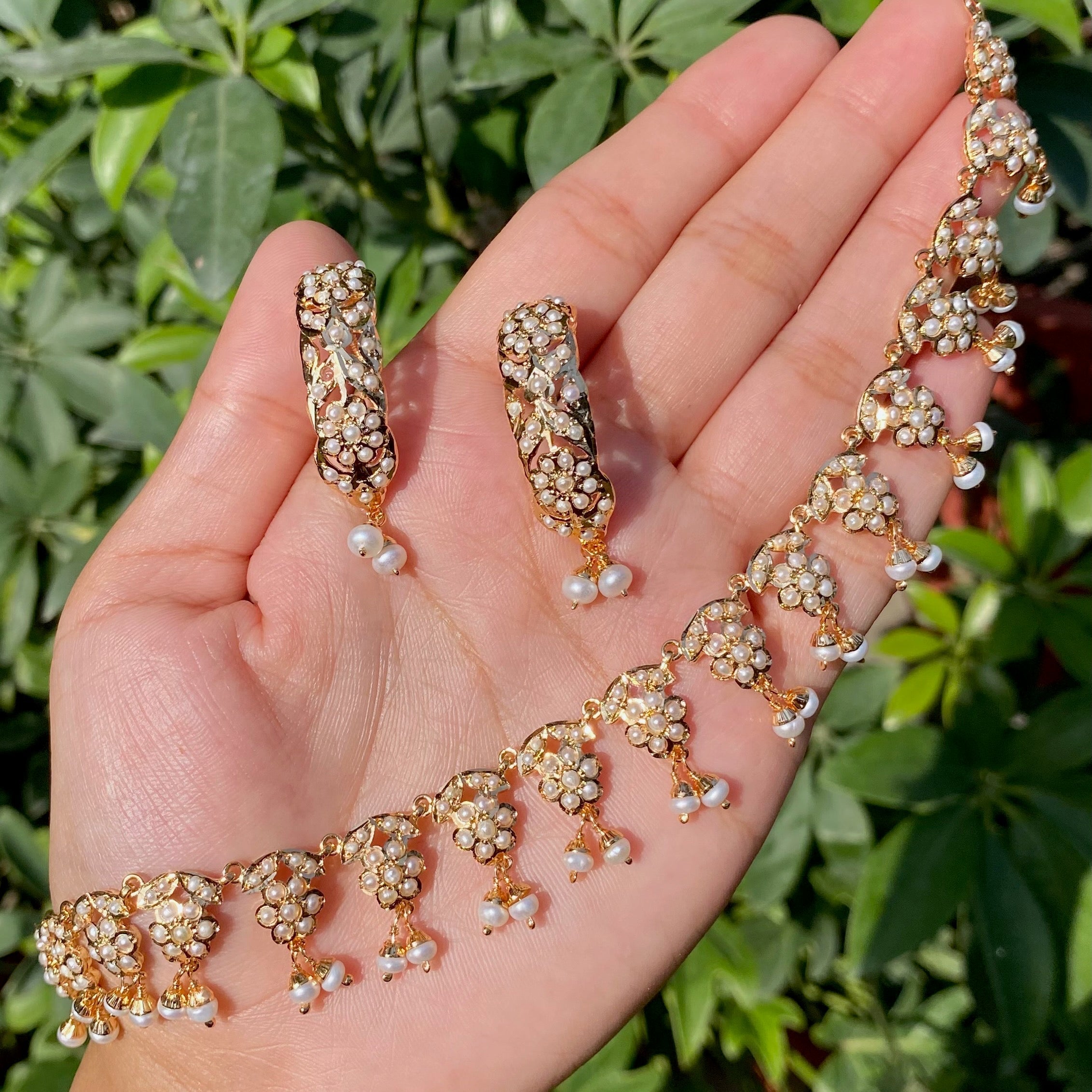 real pearl jewelry on gold polished silver