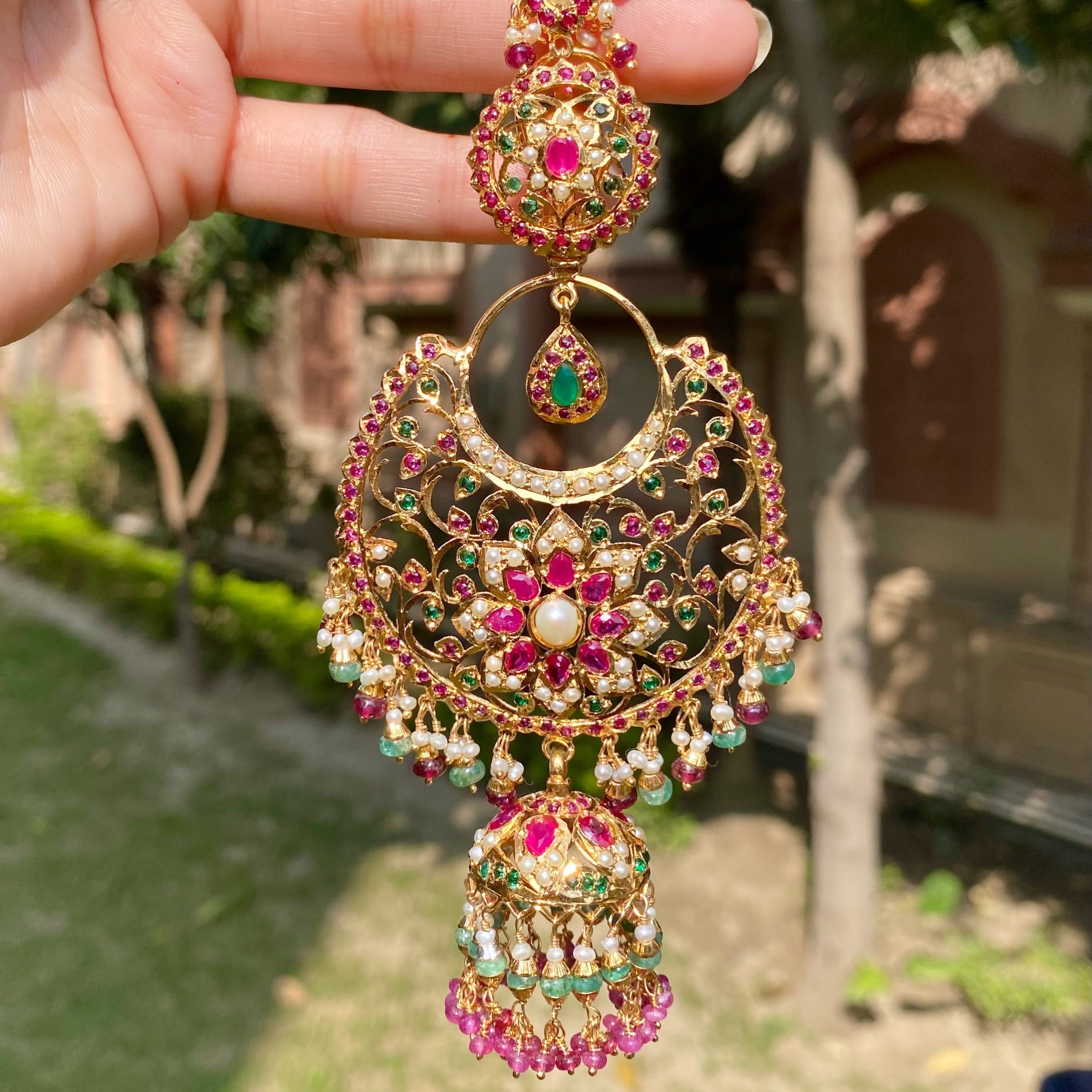 long antique chandbali earrings with jhumka at the bottom