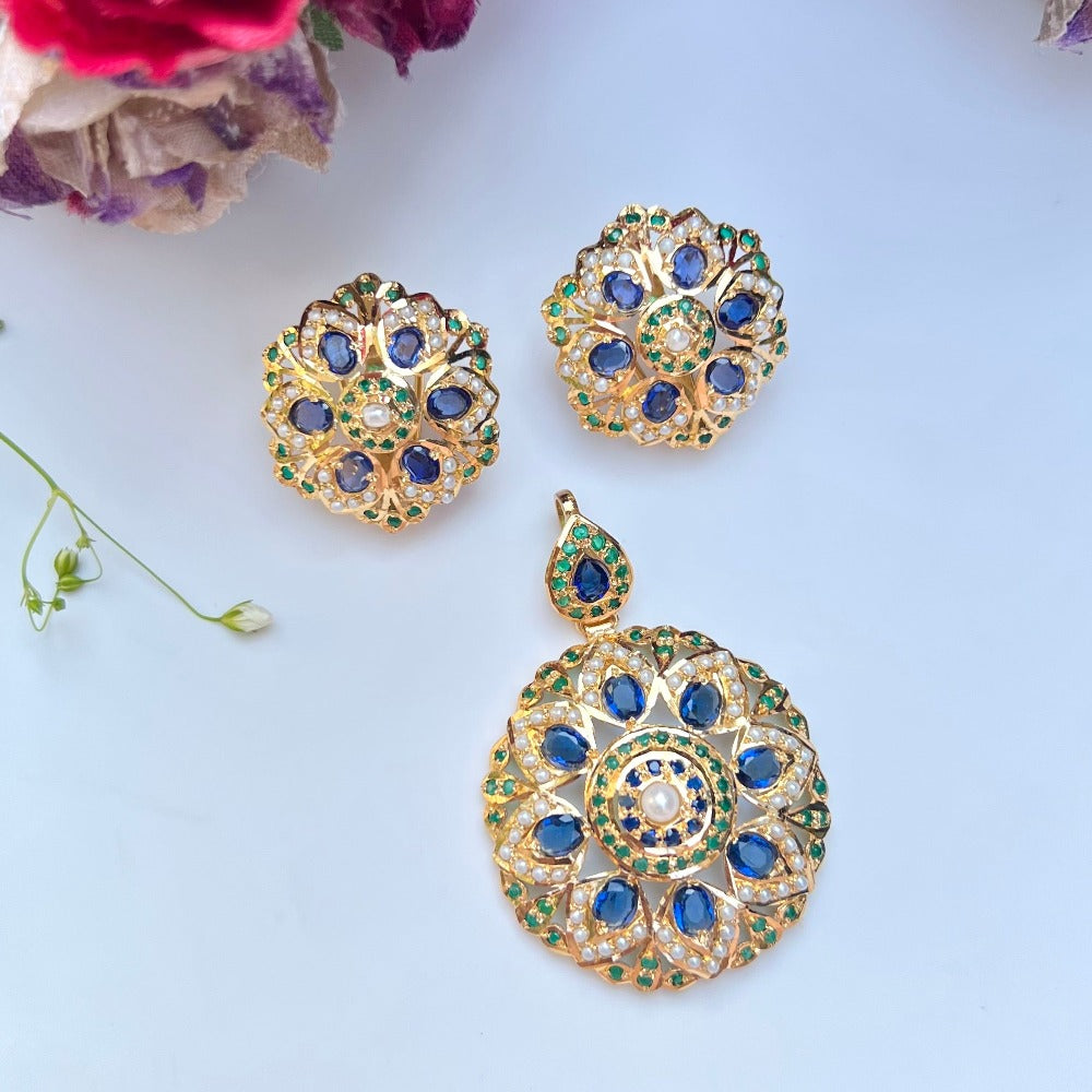 mughal design pendant set with blue sapphire, emeralds and pearls