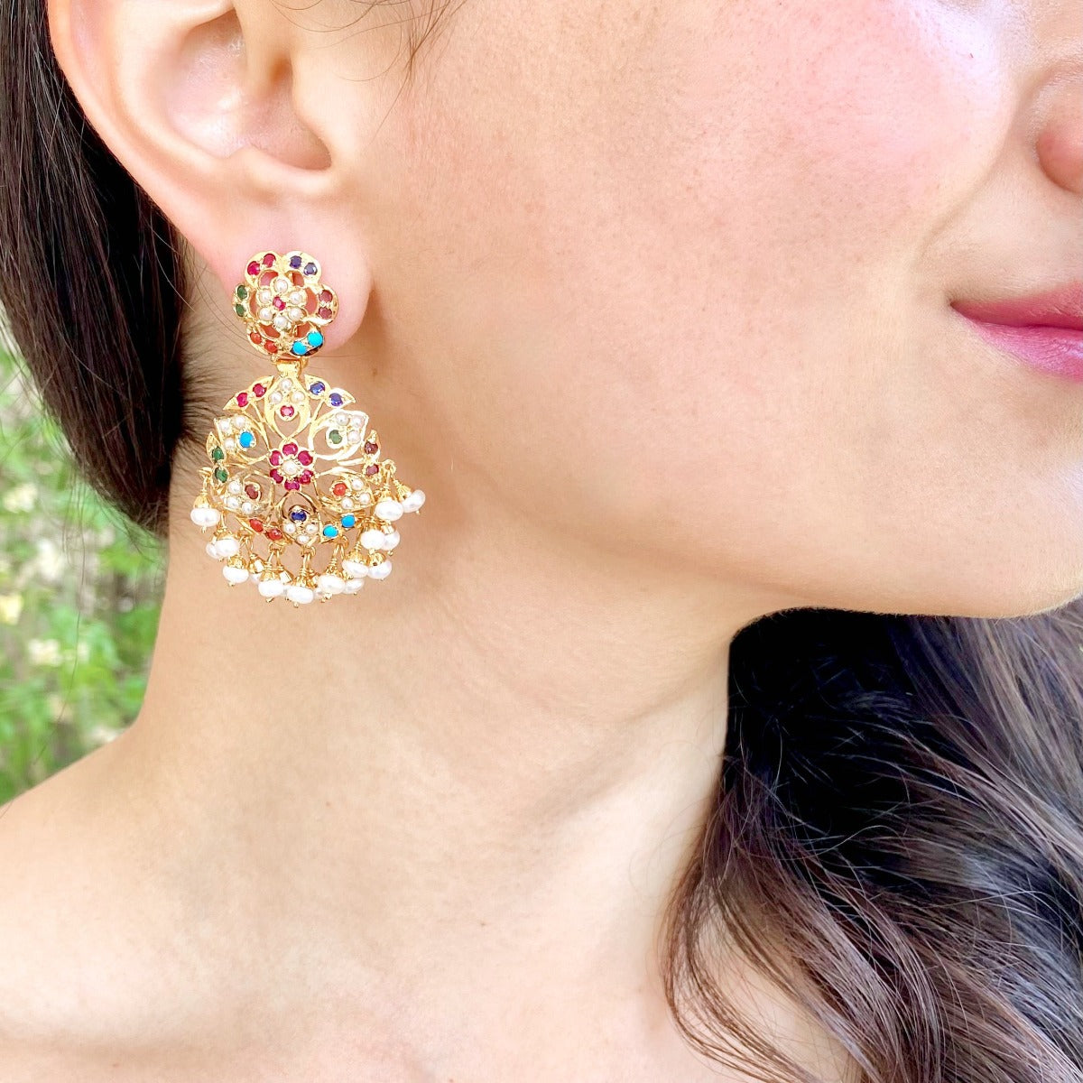 jadau earrings with navrattan stones
