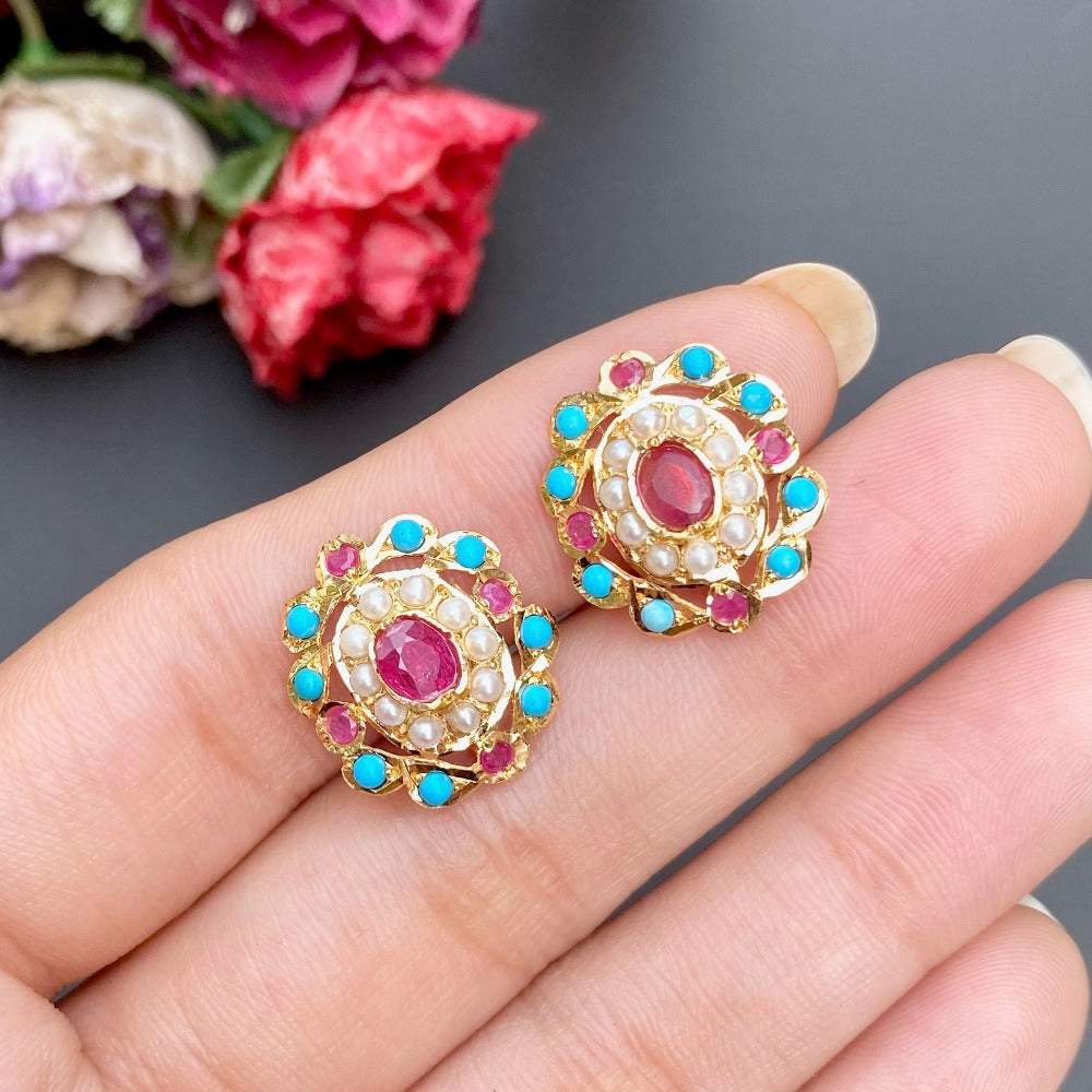 small gold earrings studded with ruby pearl and phiroza