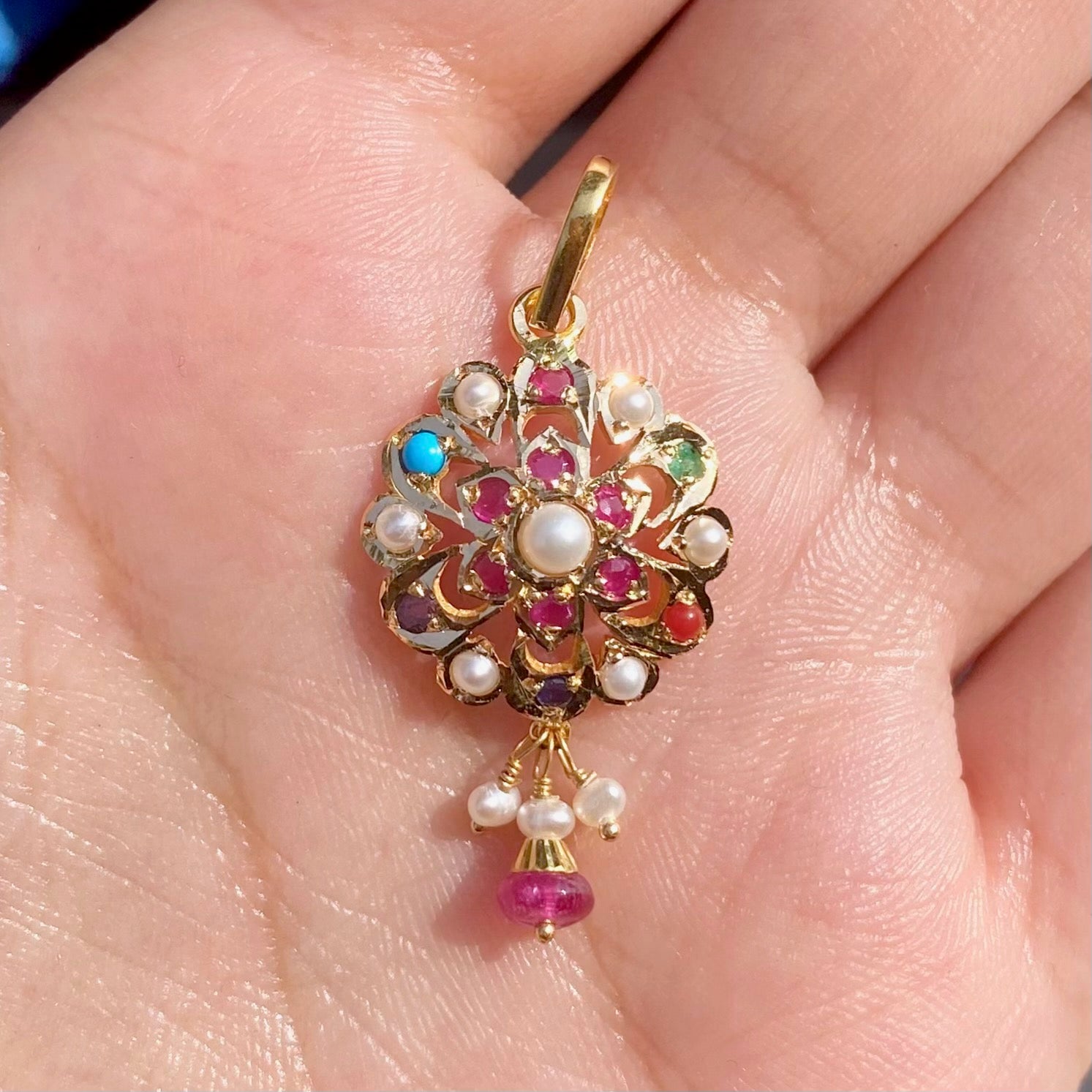 round navratna pendant only in 22k gold studded with precious stones gp 009