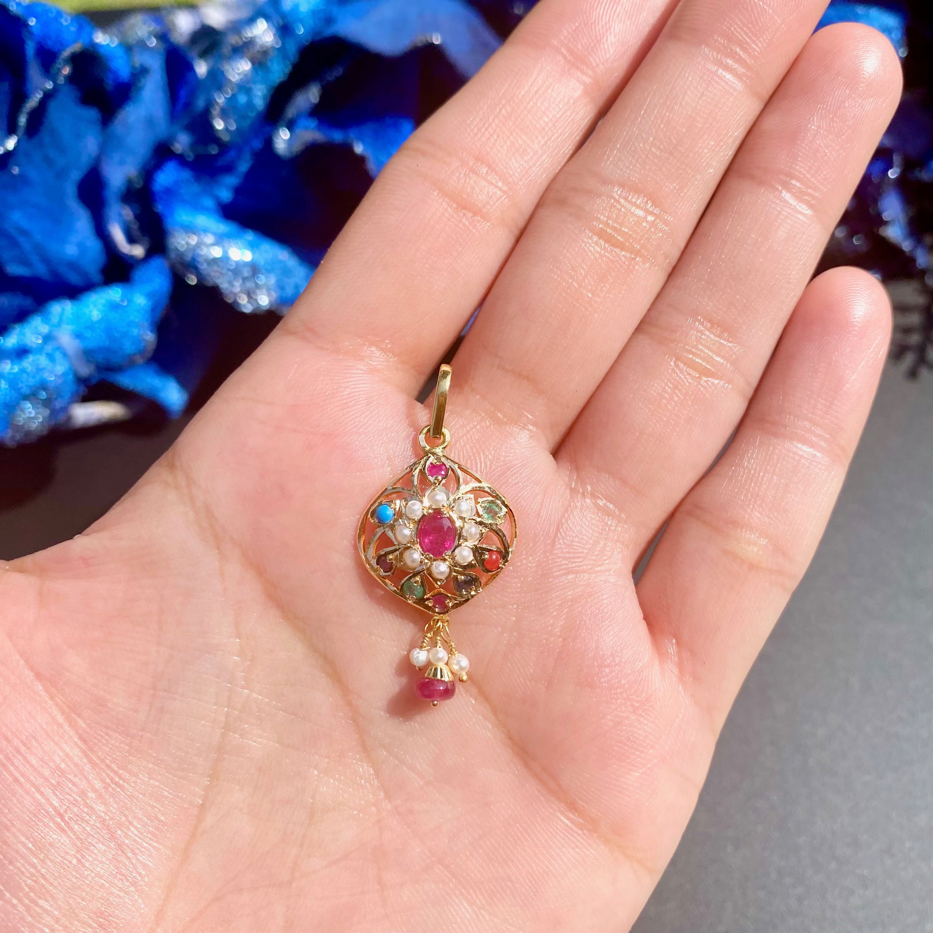 delicate navratna pendant in 22k gold studded with precious stones gp 005