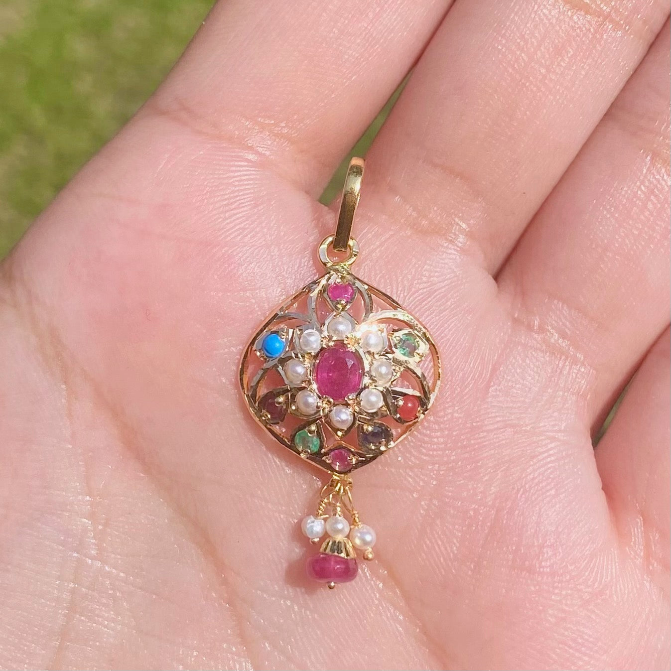 delicate navratna pendant in 22k gold studded with precious stones gp 005