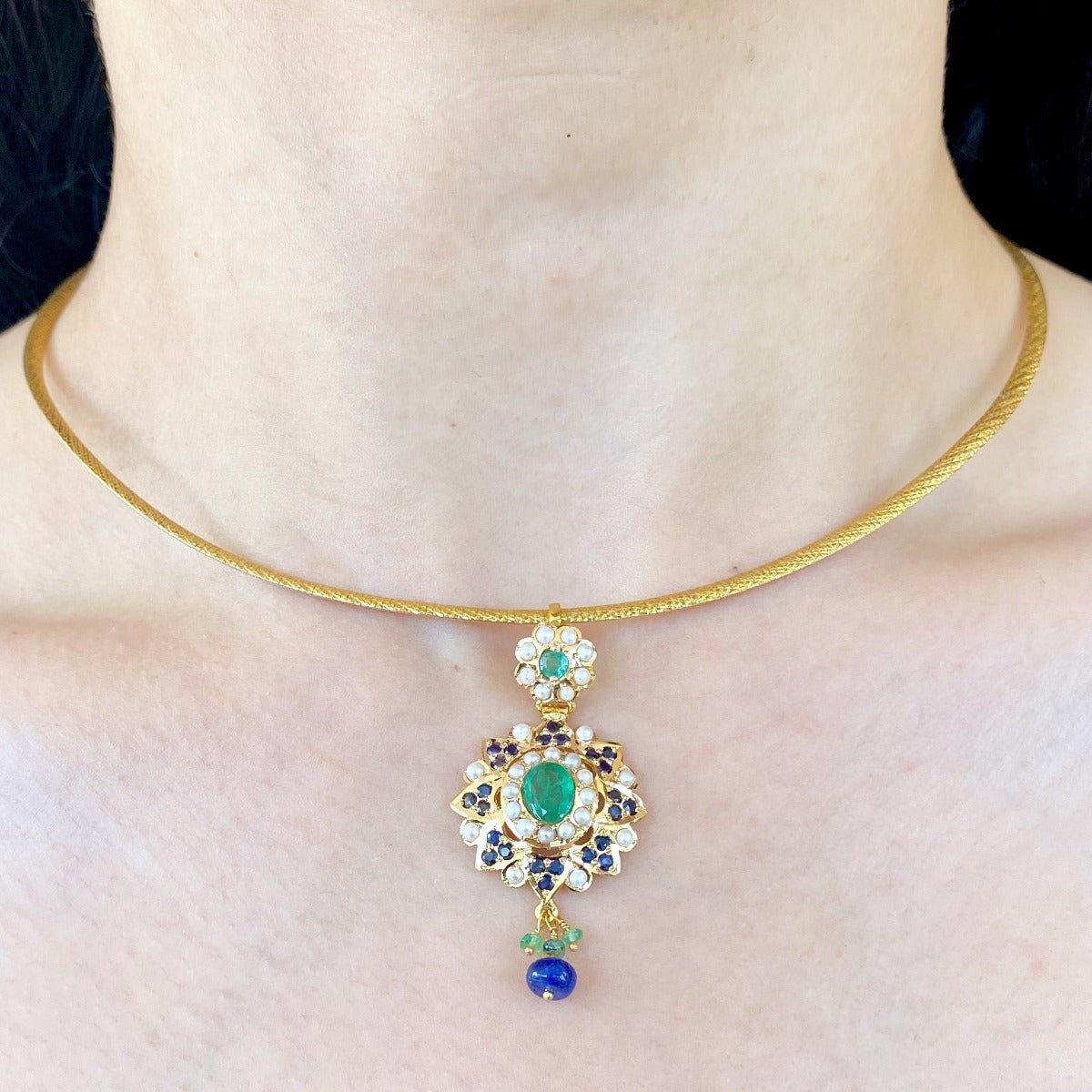 delicate gold pendant