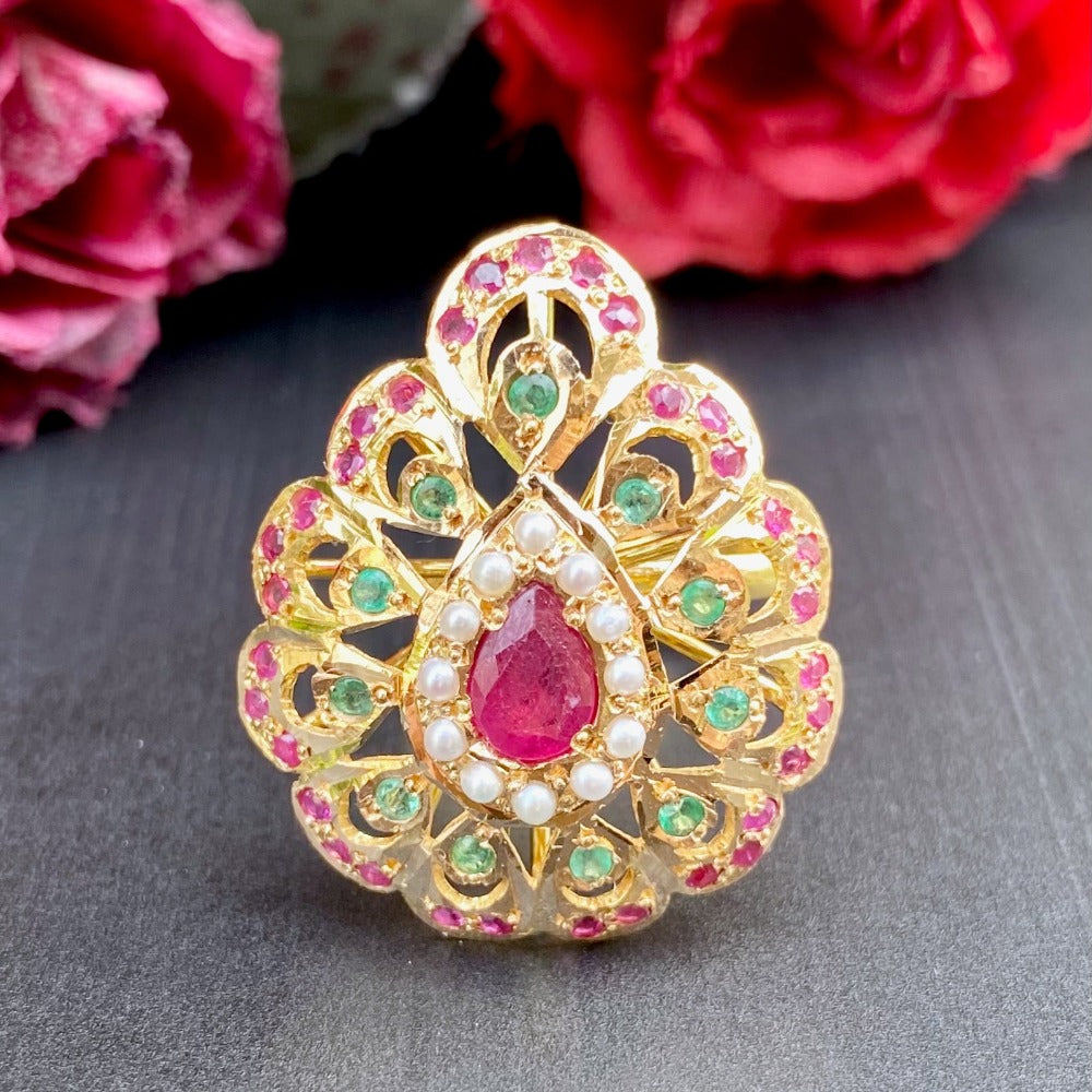 gold cocktail ring with ruby