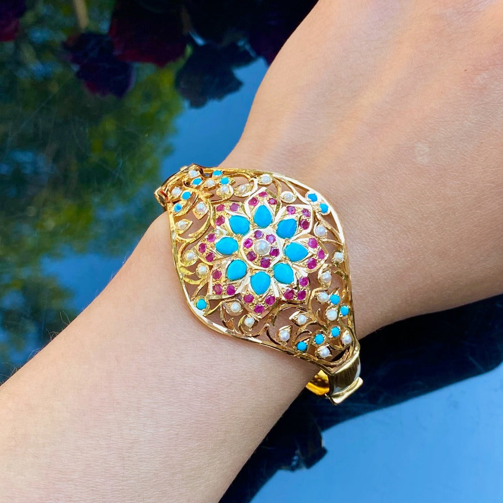 turquoise bracelet in gold