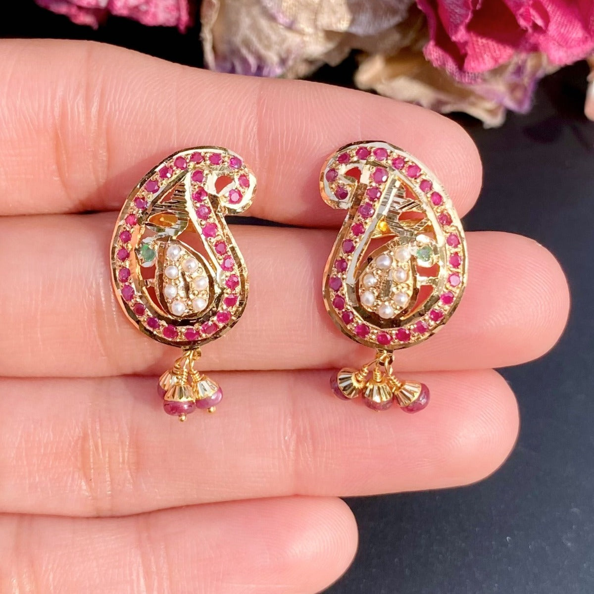 paisley shaped jadau studs gold