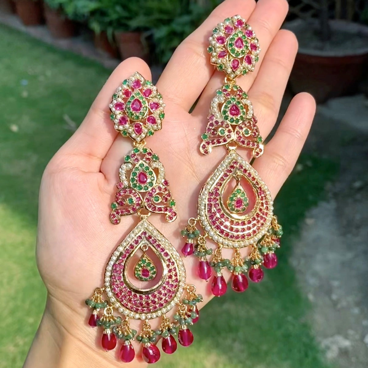jadau long drop shaped danglers in gold plated silver multicolored