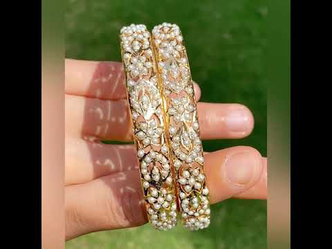 gold plated bangles studded with pearls on silver