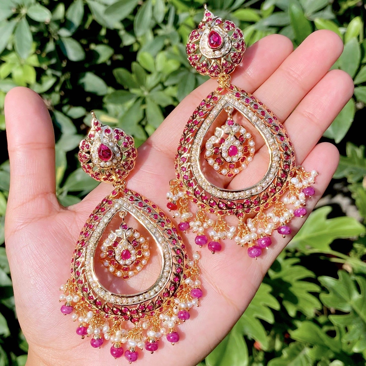 long drop shaped chandbali ruby red earrings made on sterling silver with gold plating