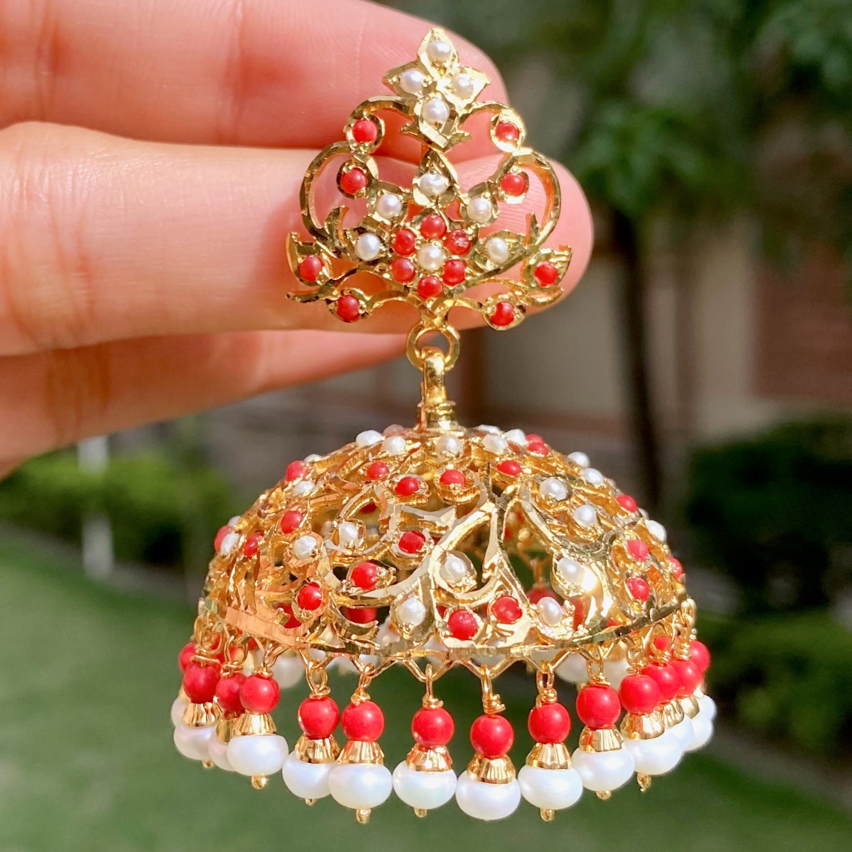 large gold plated jhumka earrings