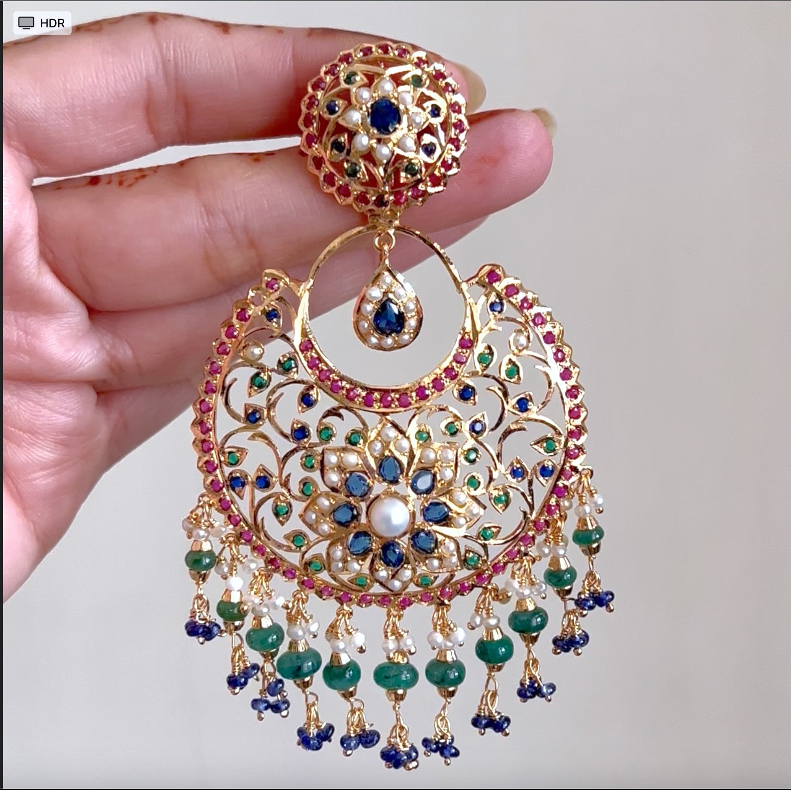 antique chandbali earrings on 925 silver with gold plating and studded with red green blue stones with pearls