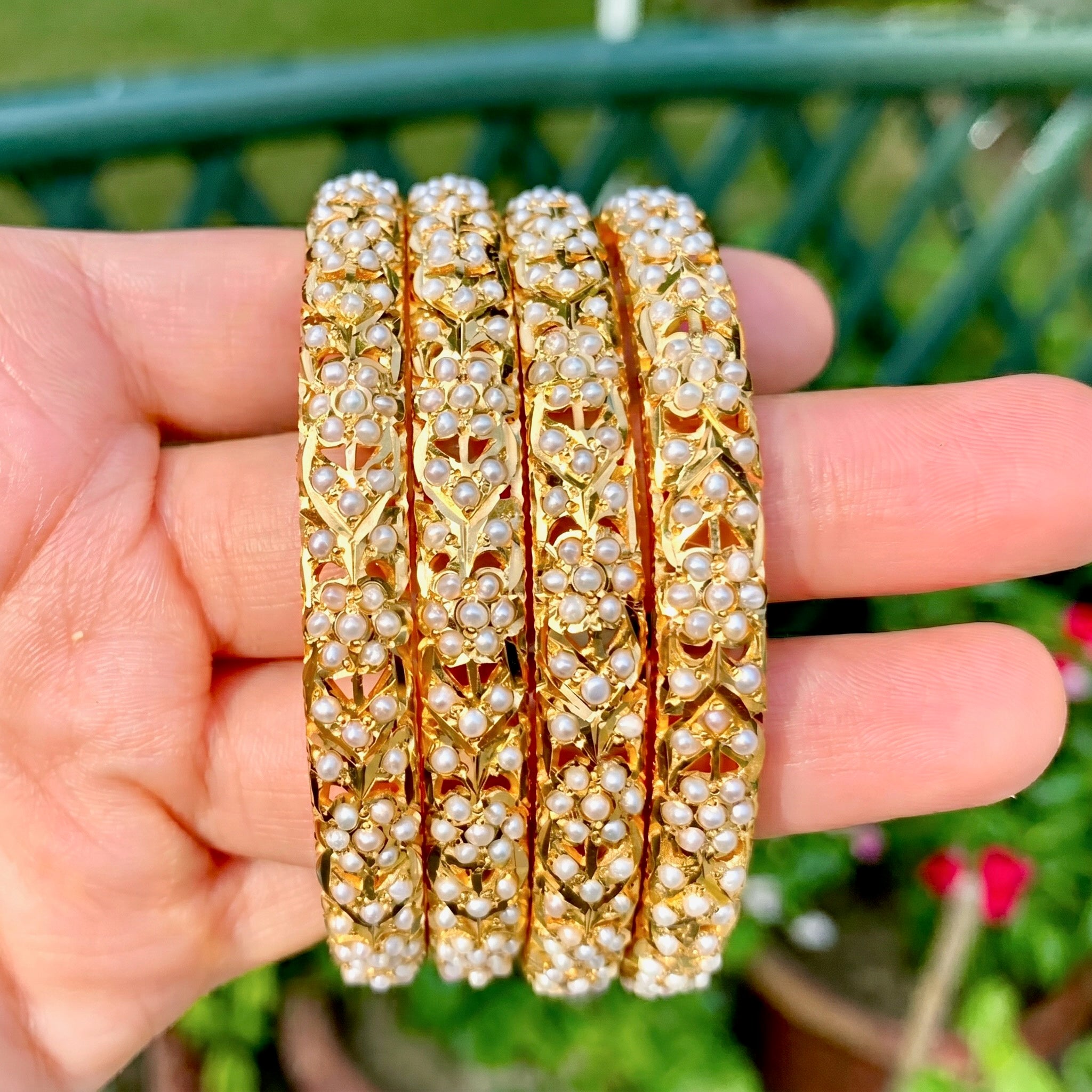 pearl bangles in gold plated silver