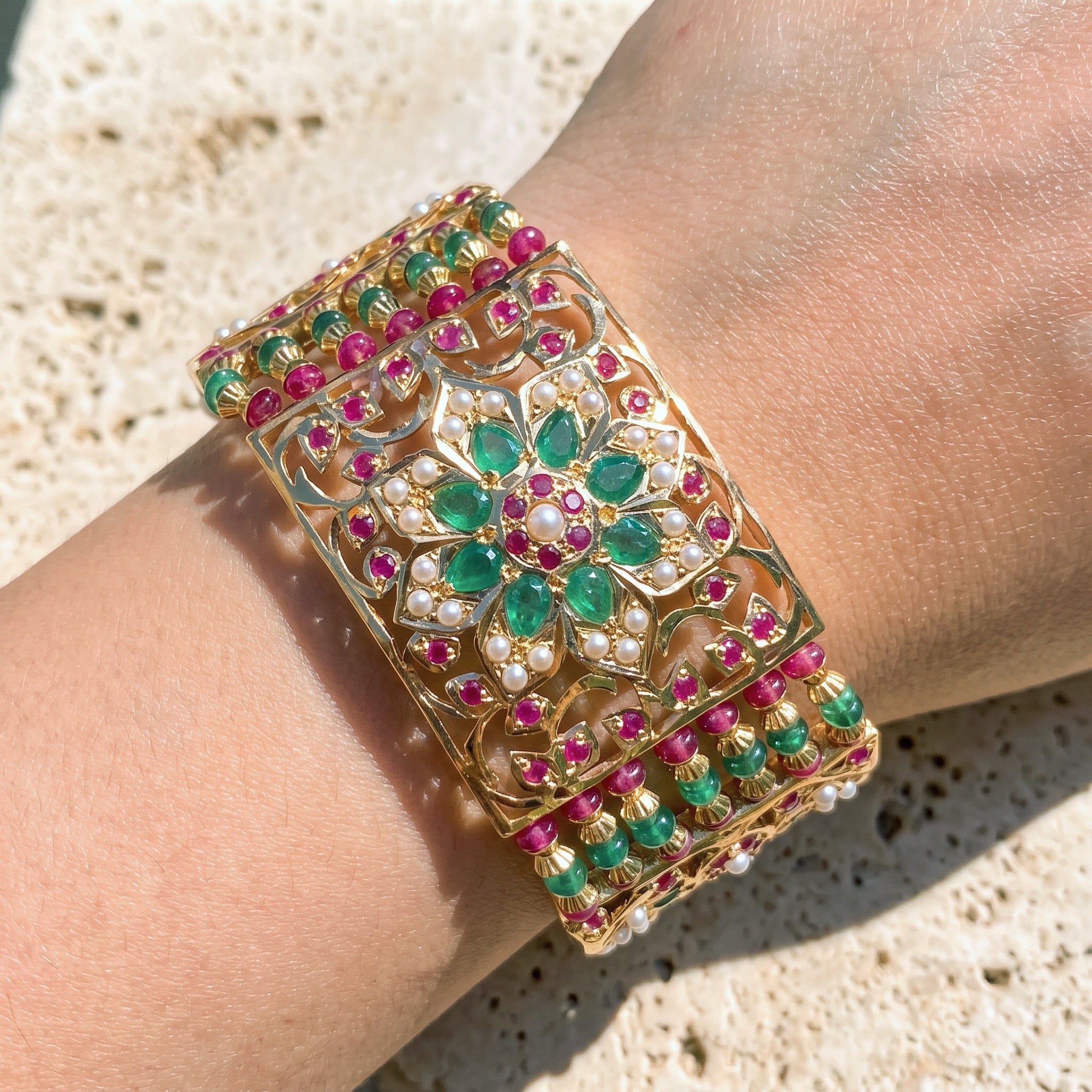 original gold bracelet for women studded with precious stones