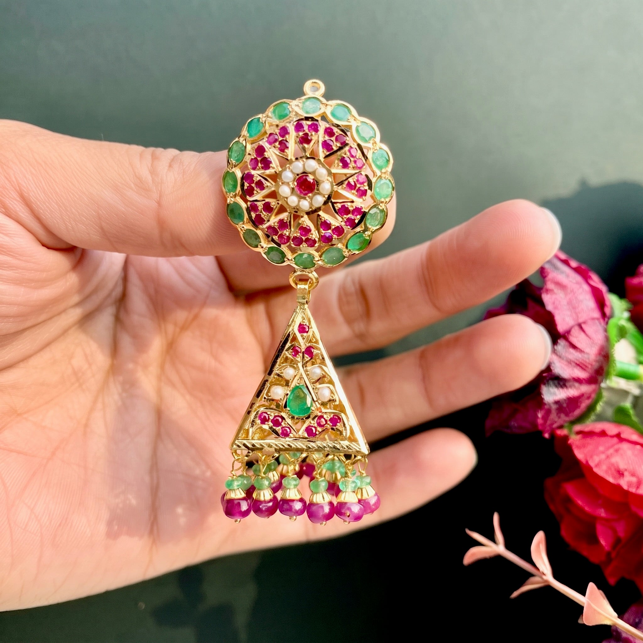 gold jhumka earrings for women made with jadau technique