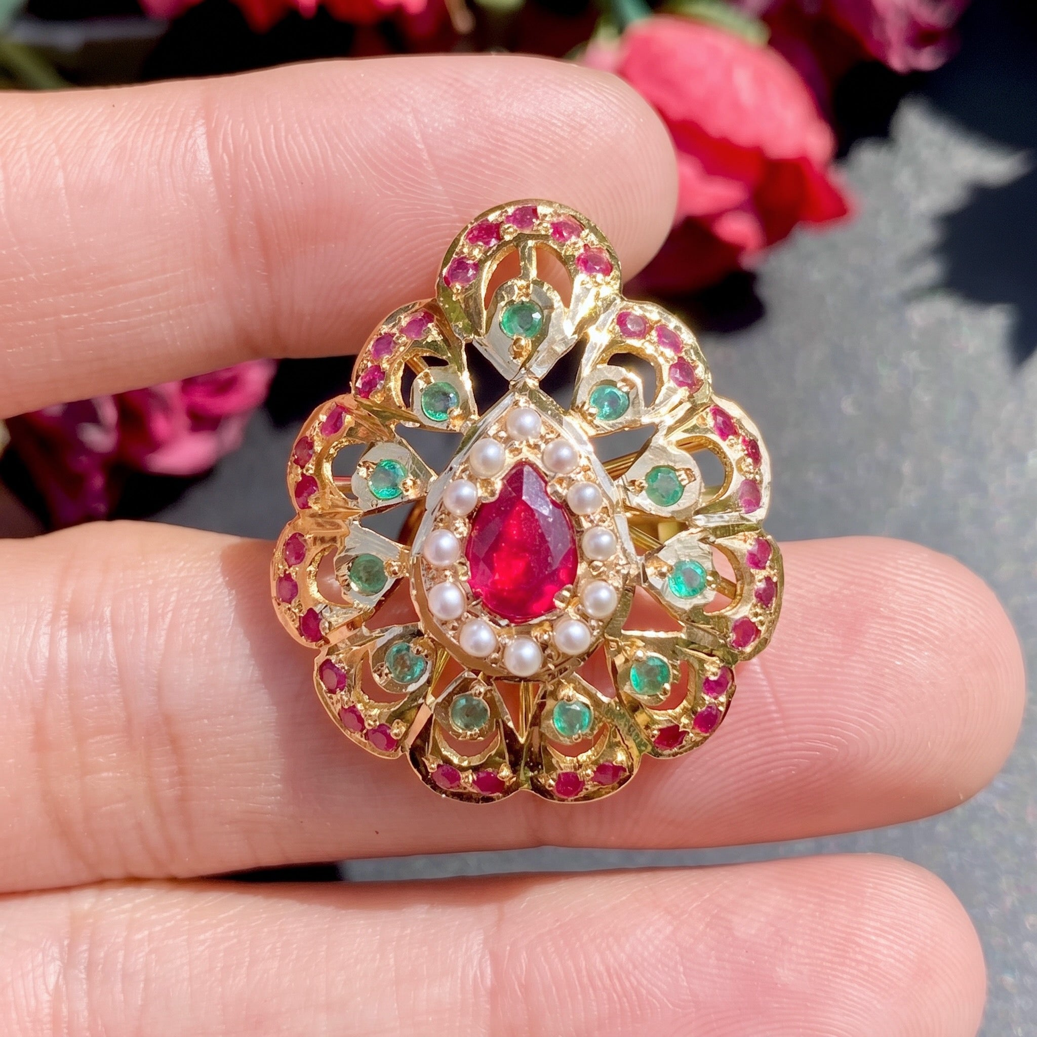 handmade gold ring studded with precious stones