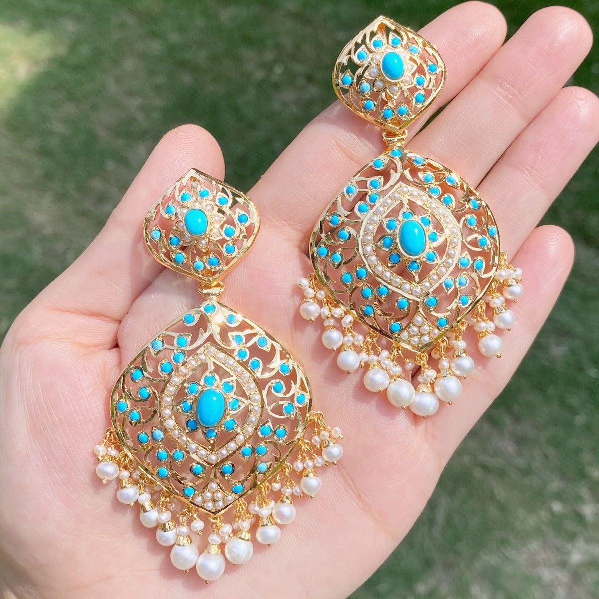 jadau earrings in silver with gold plating