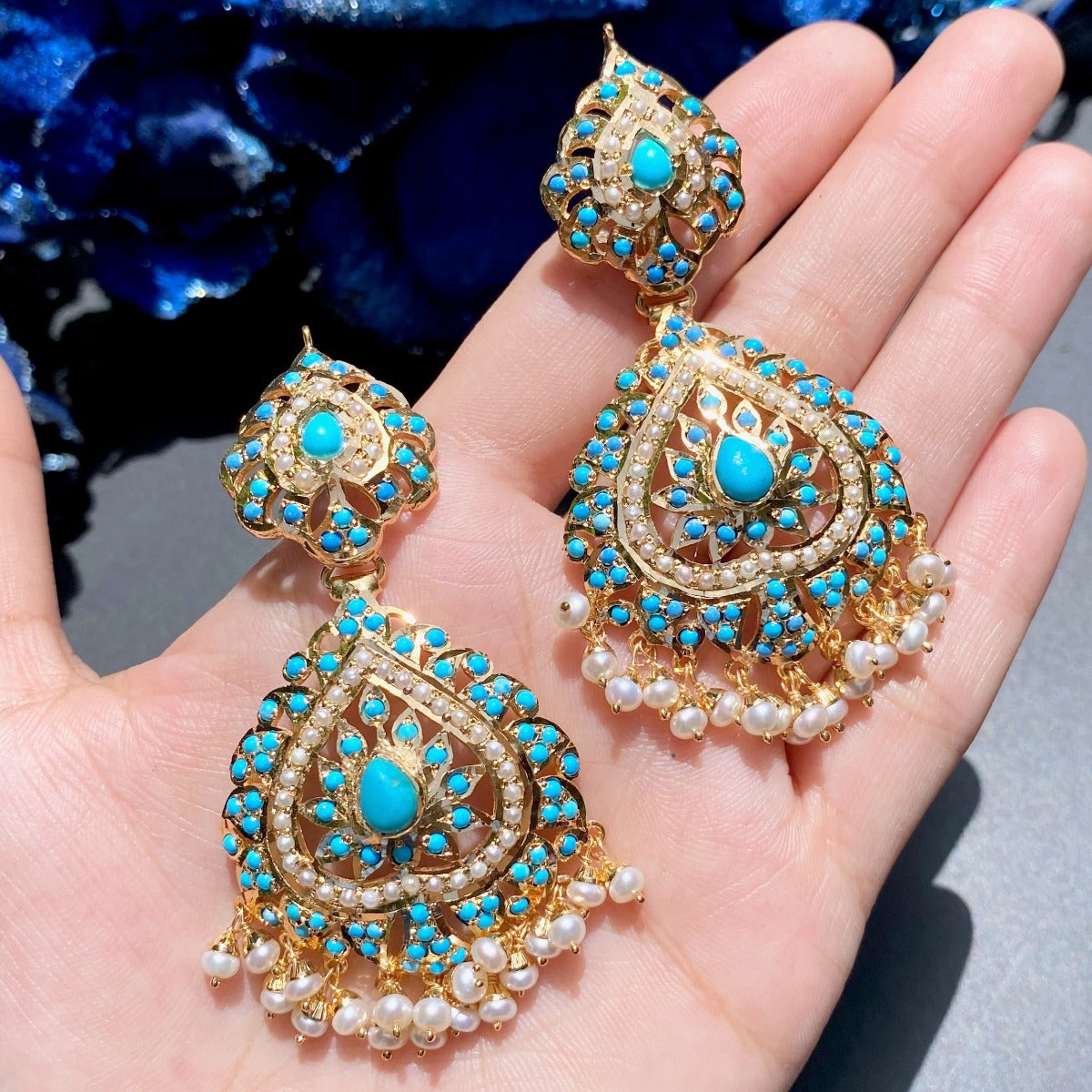 gold plated earrings featuring pearls and turquoise