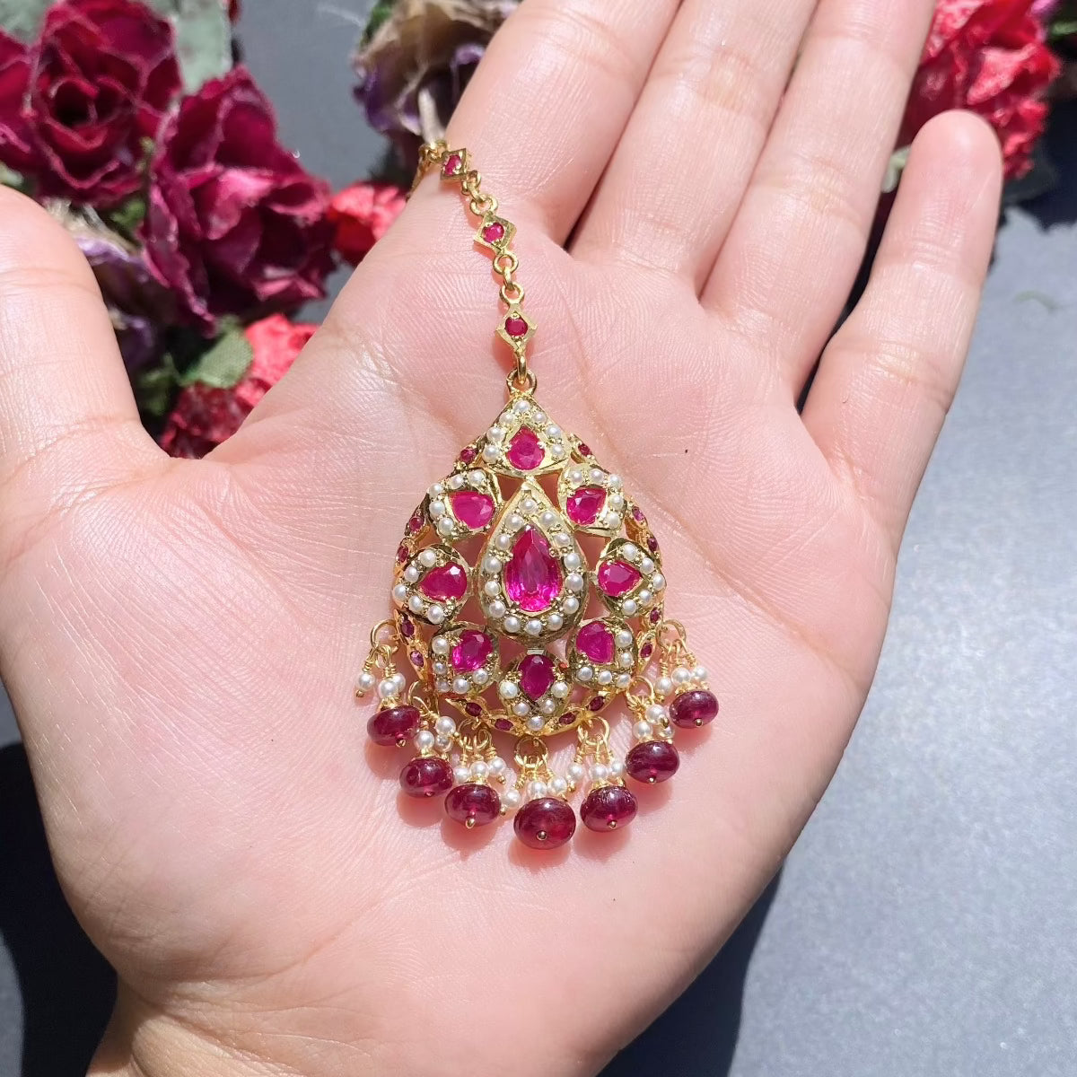 gold plated ruby tikka