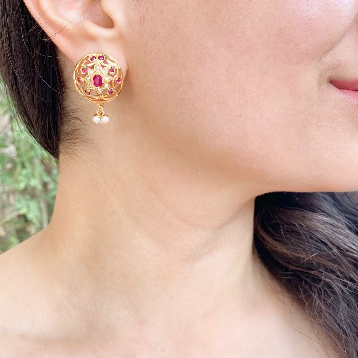 gold polished ruby earrings