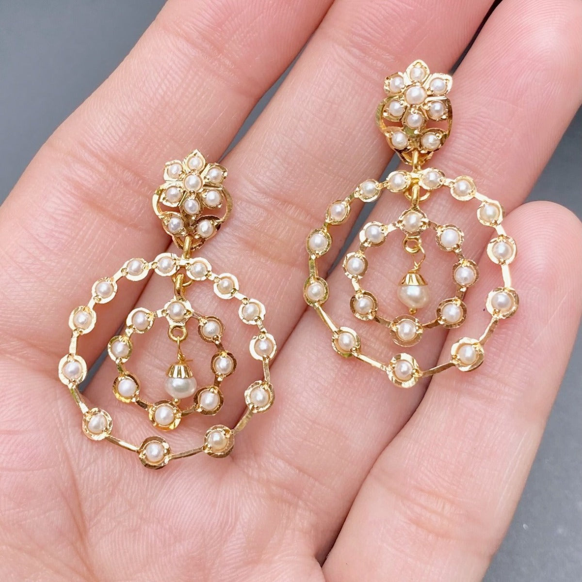 916 gold earrings set with seed pearls
