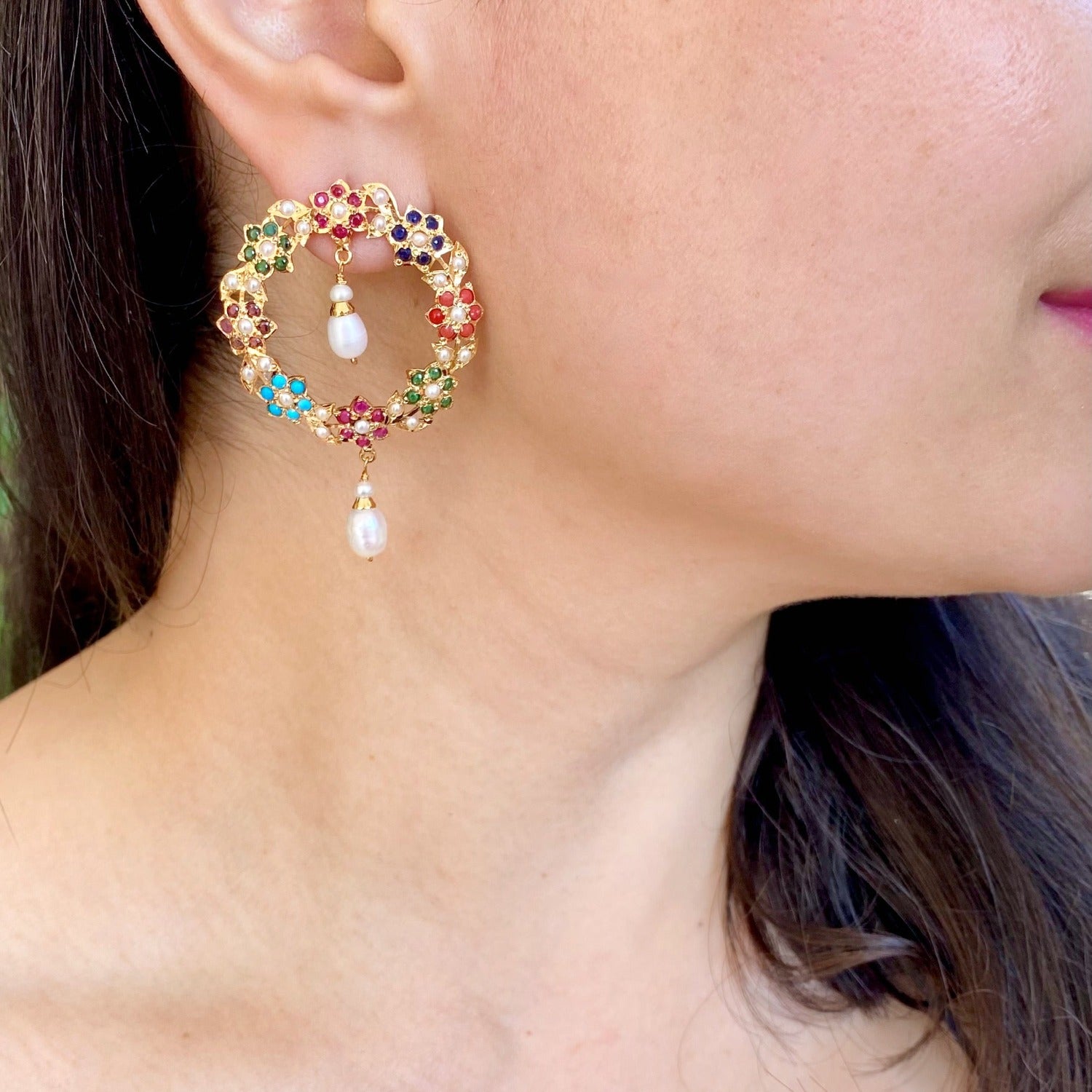delicate jadau earrings