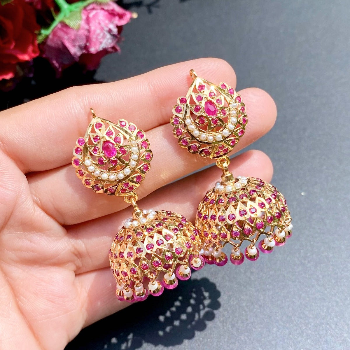 traditional indian jhumka earrings in ruby on gold plated silver