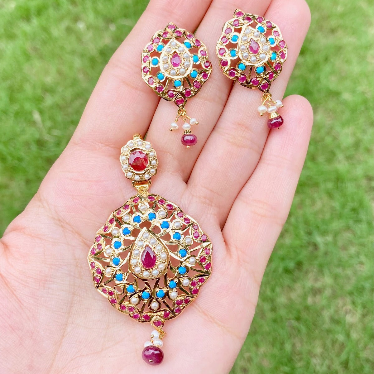 Gold earrings with on sale pendant set