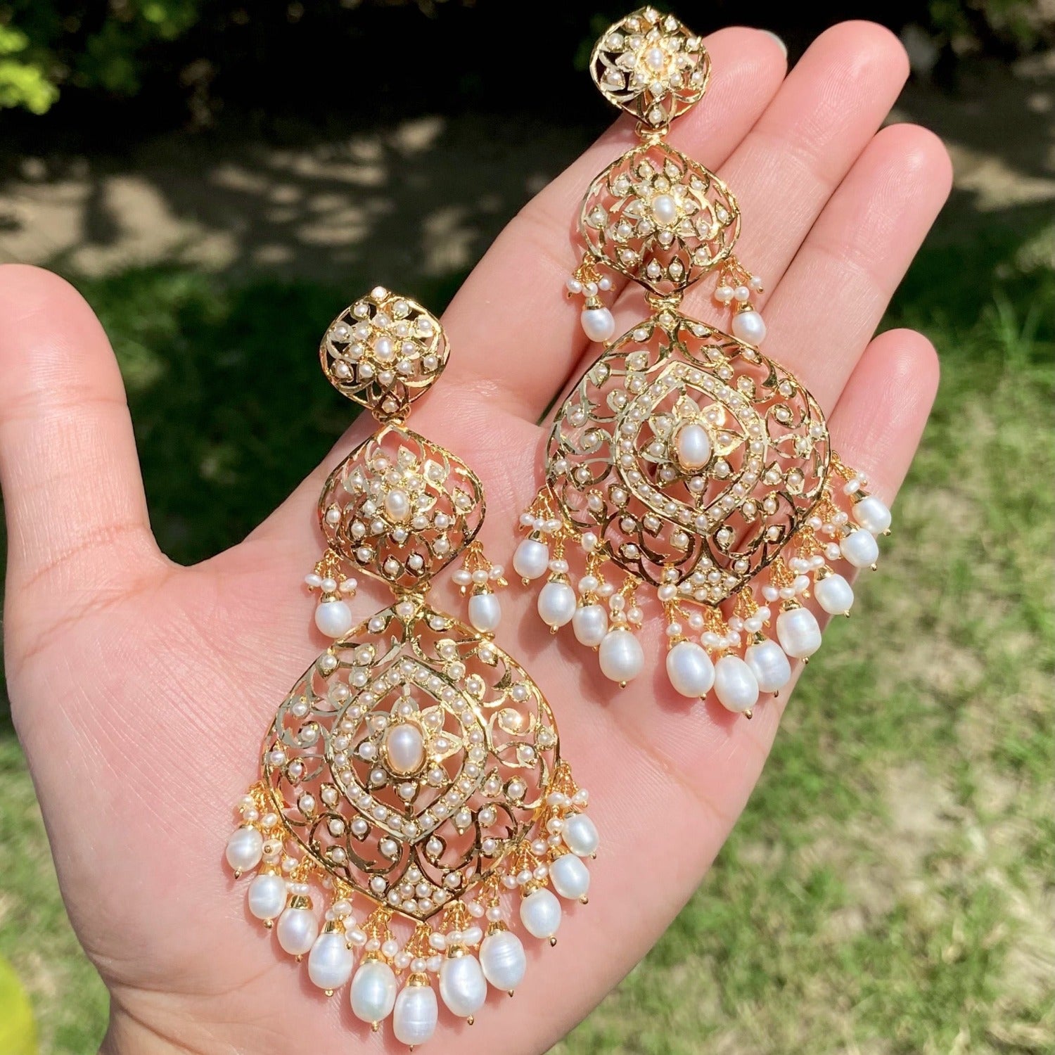 statement jadau earrings in gold