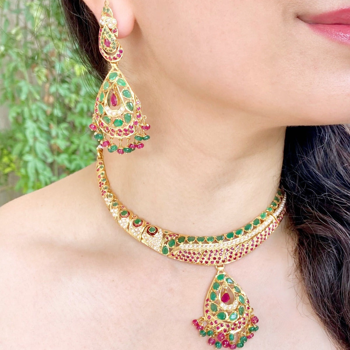 916 hallmark gold necklace set adorned with emeralds and ruby