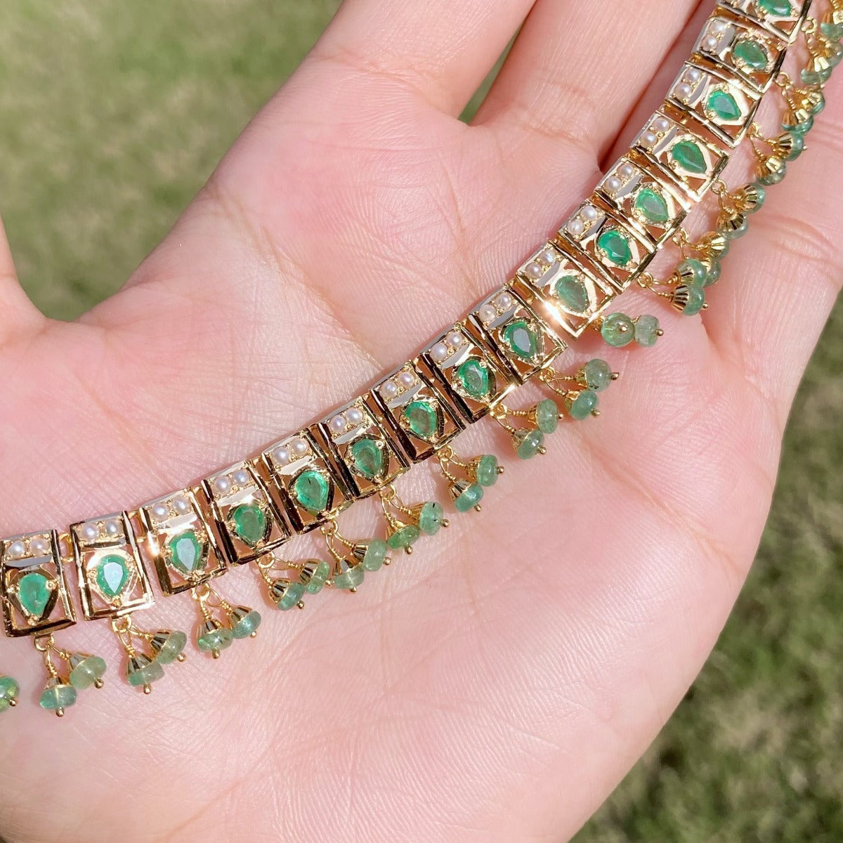 emerald necklace in gold